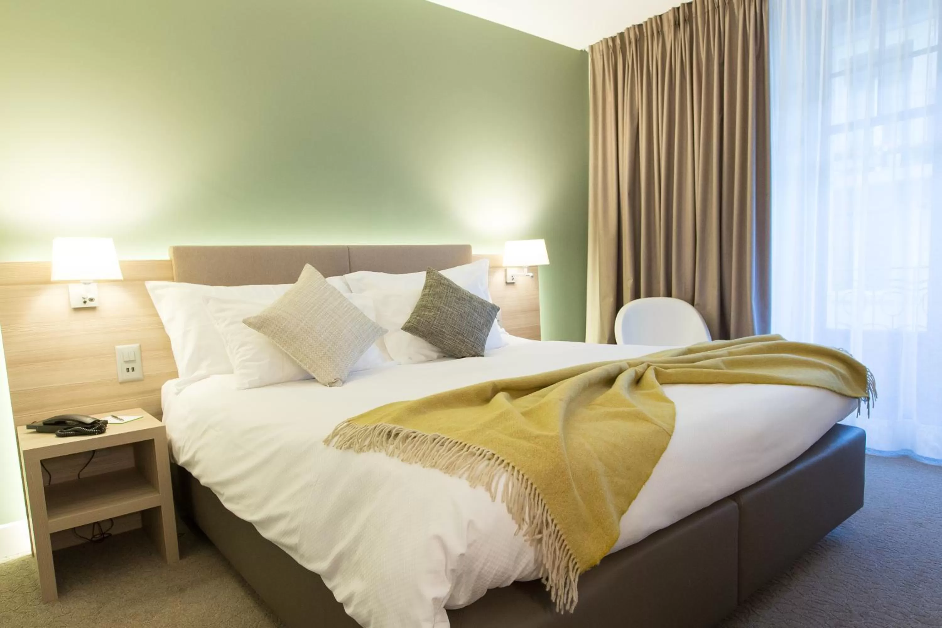 Bed in Hôtel des Voyageurs Boutique