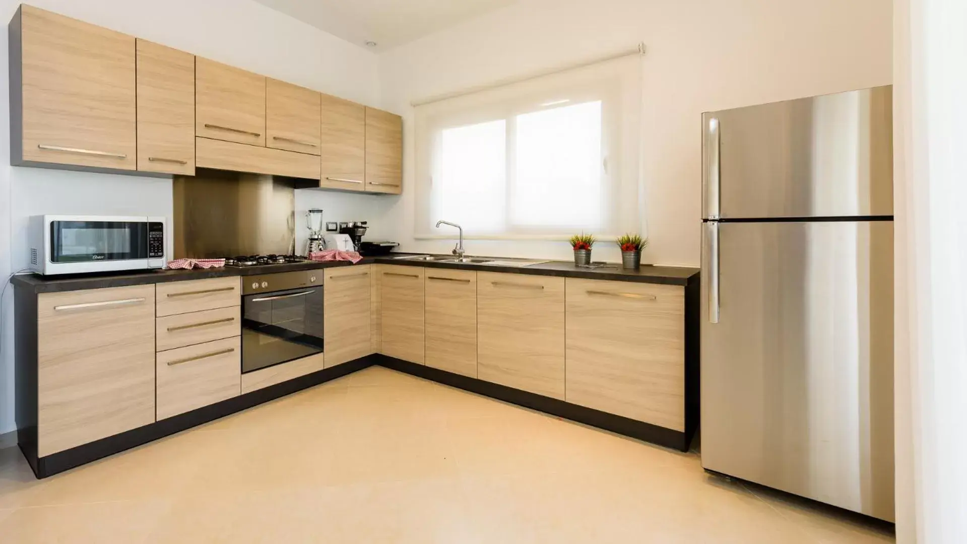 Kitchen/Kitchenette in Aligio Apart-hotel & Spa - Las Terrenas