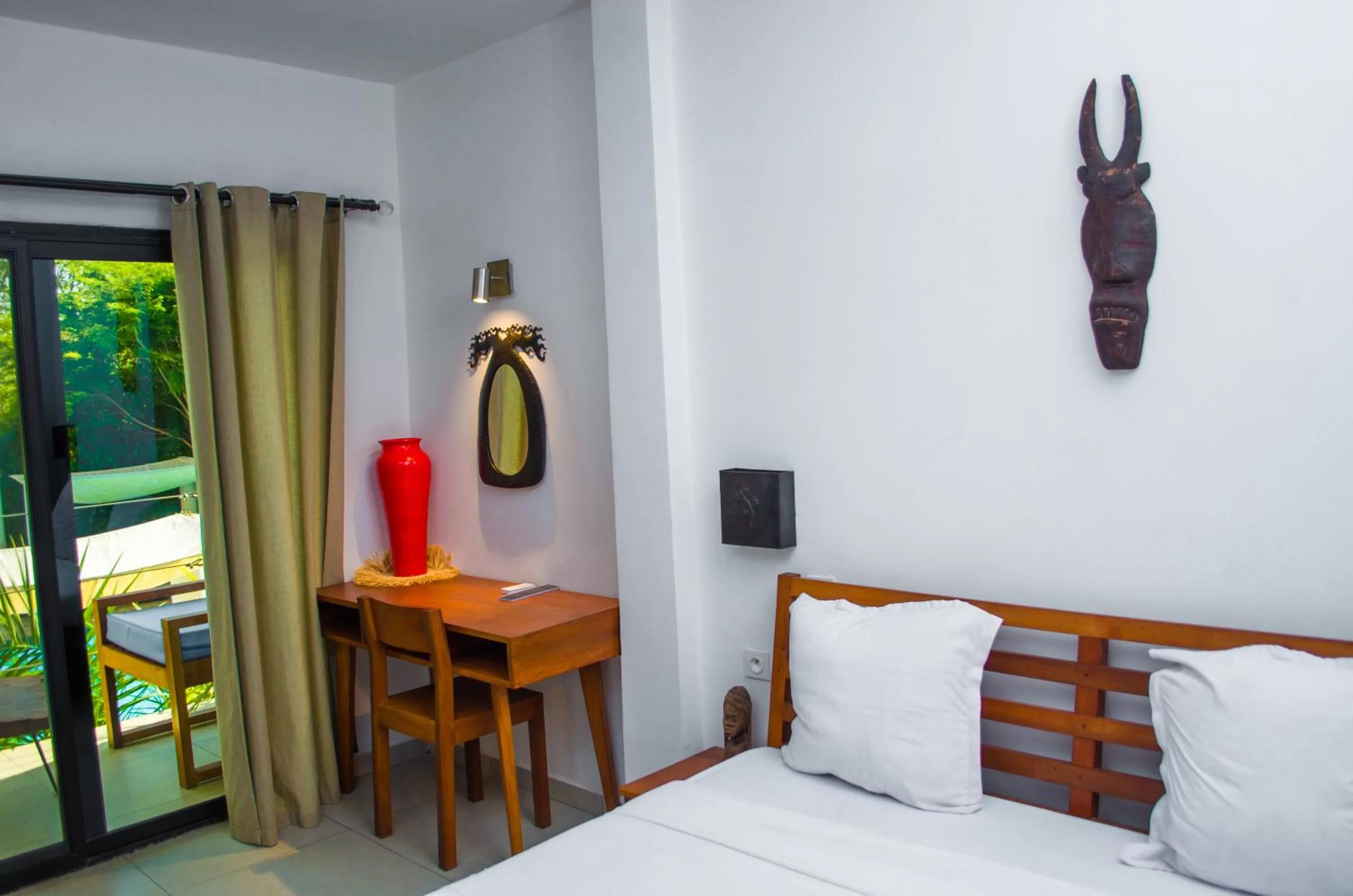 Seating area, Bed in Ikopa Hôtel Madagascar