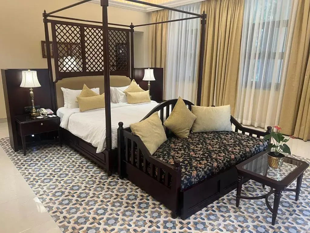 Bed in Royal Orchid Metropole Mysore