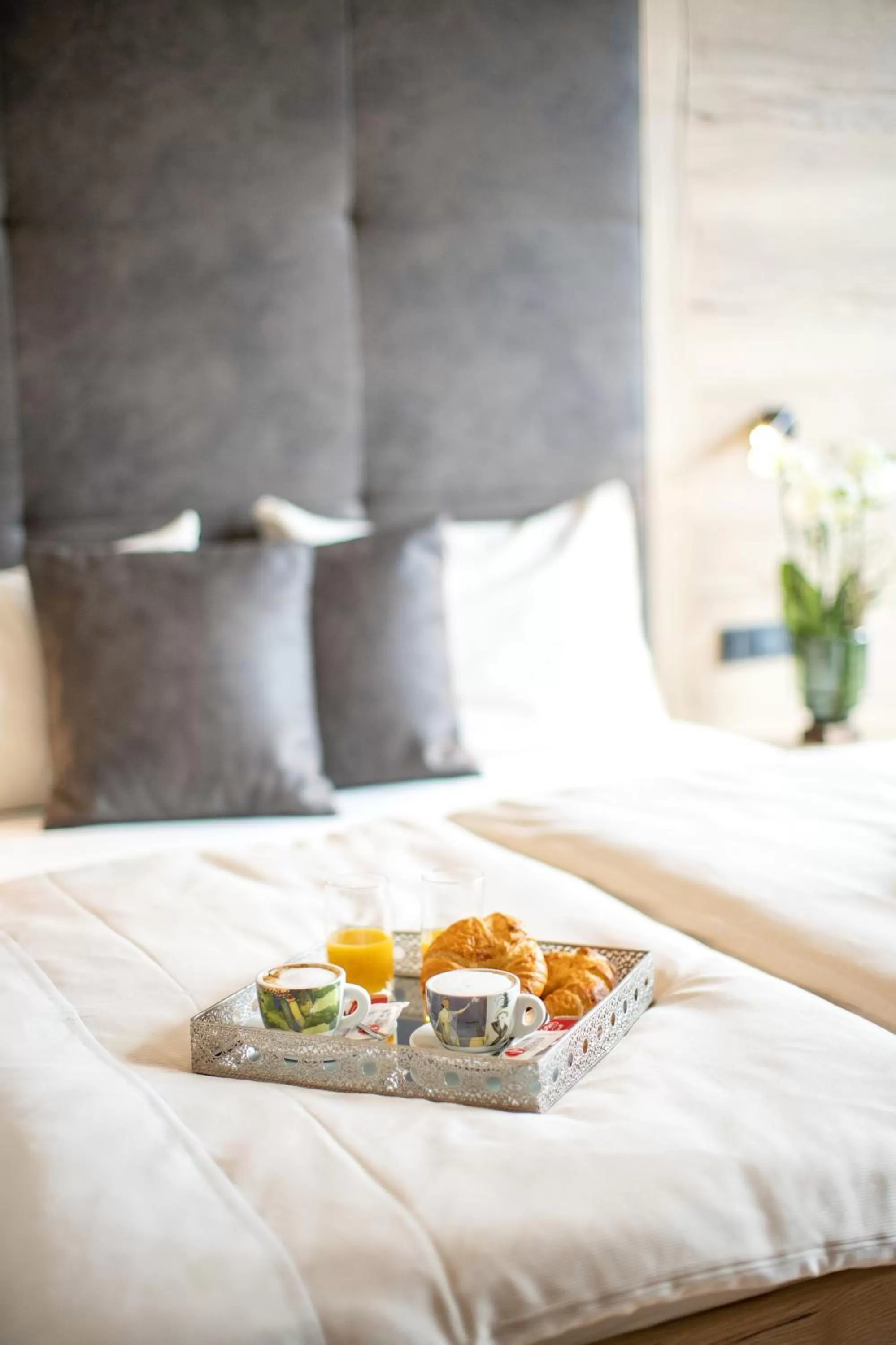 Bed in Emma Deluxe Aparthotel direkt beim Skibus