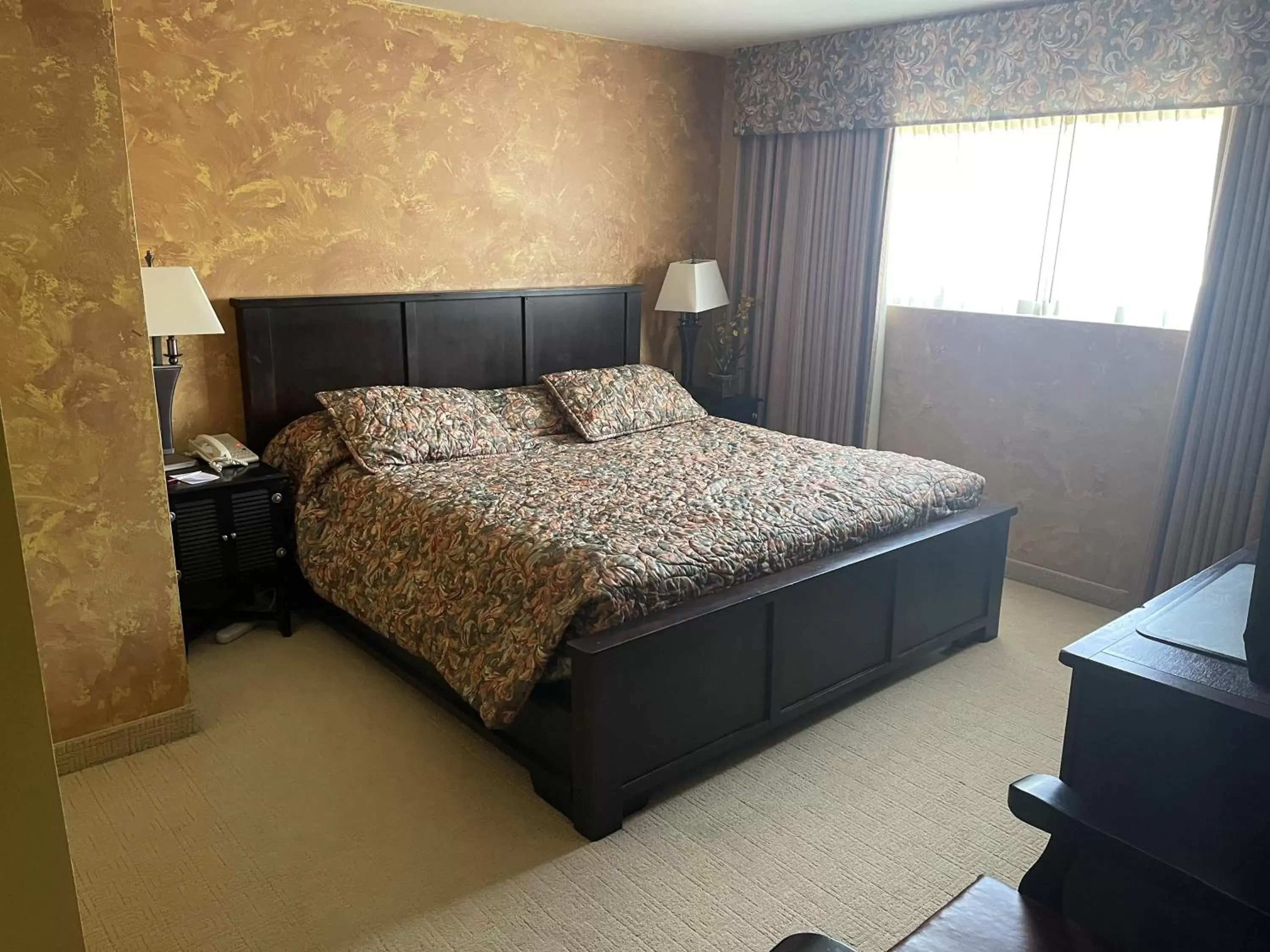 Bed in Ramada by Wyndham Viscount Suites Tucson East