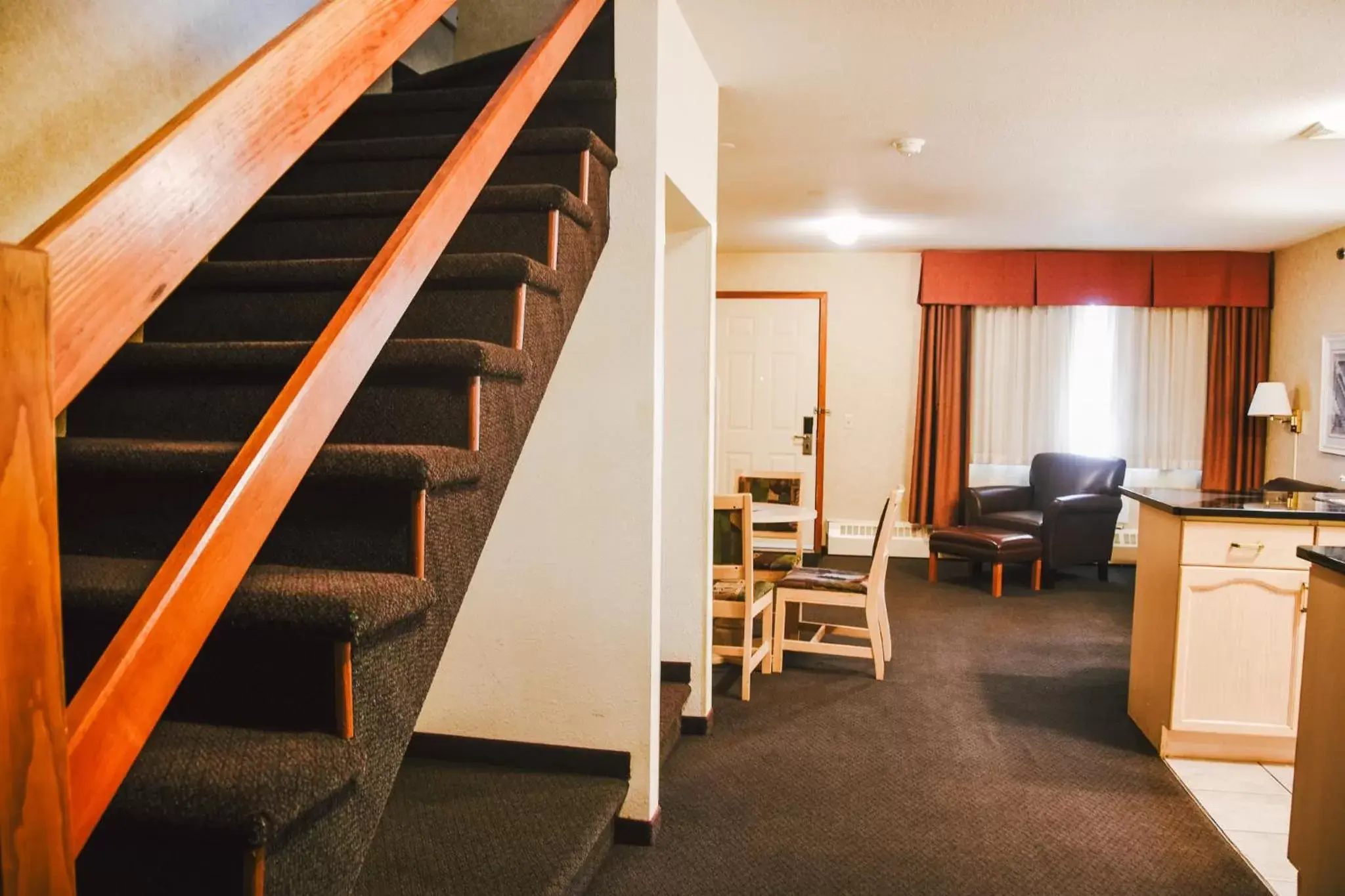 Photo of the whole room, Seating Area in Stony Plain Inn & Suites