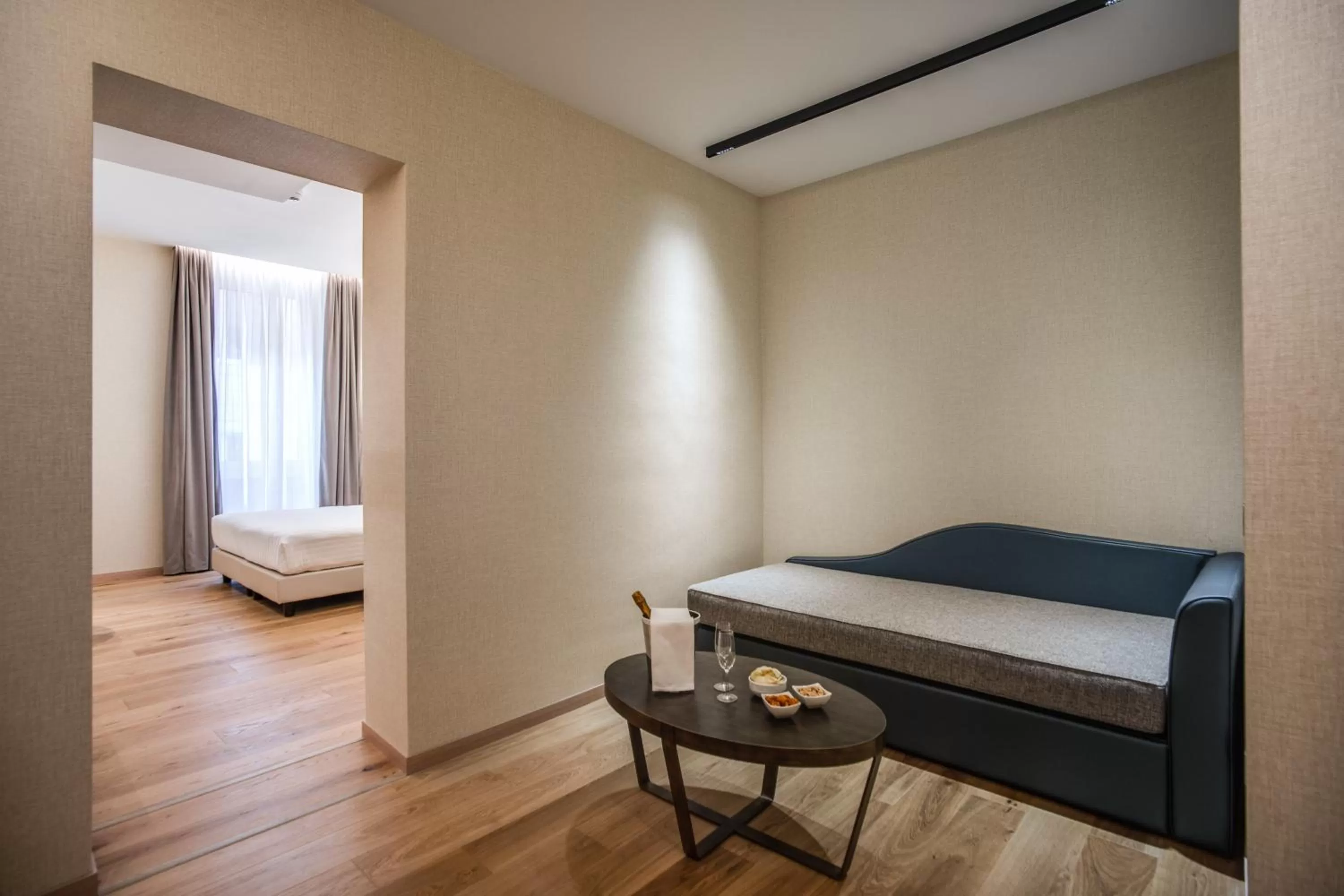 Seating area, Bed in CC Palace Hotel