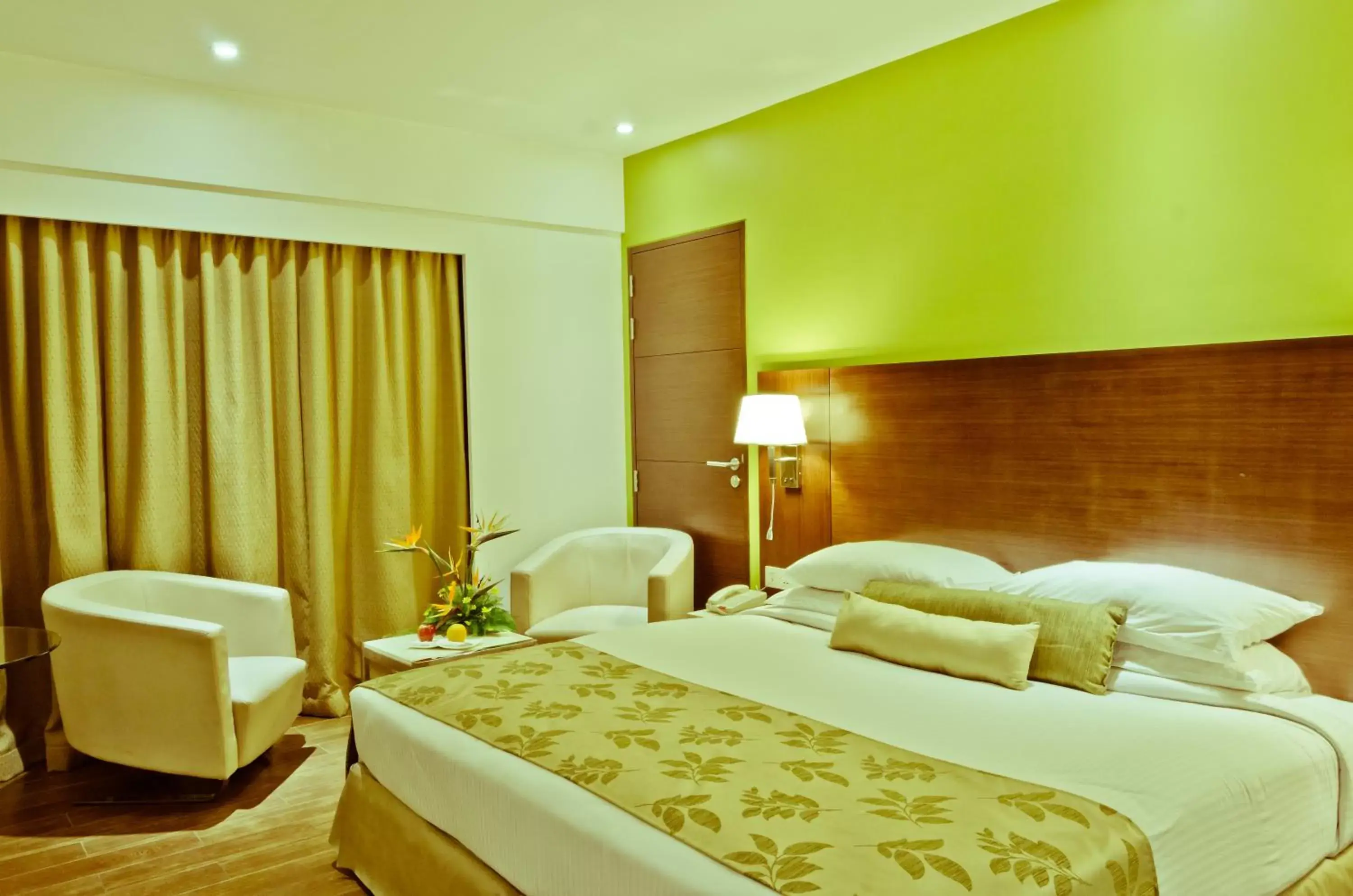 Bed in Ramee Grand Hotel and Spa, Pune