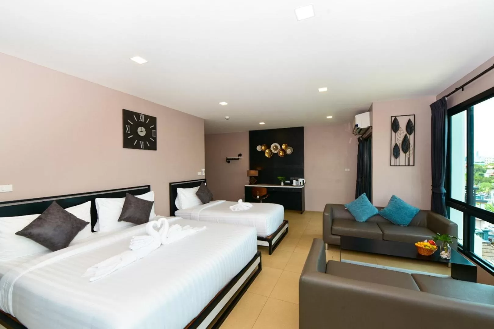 Bed in NORN Rimklong Bangkok Hotel