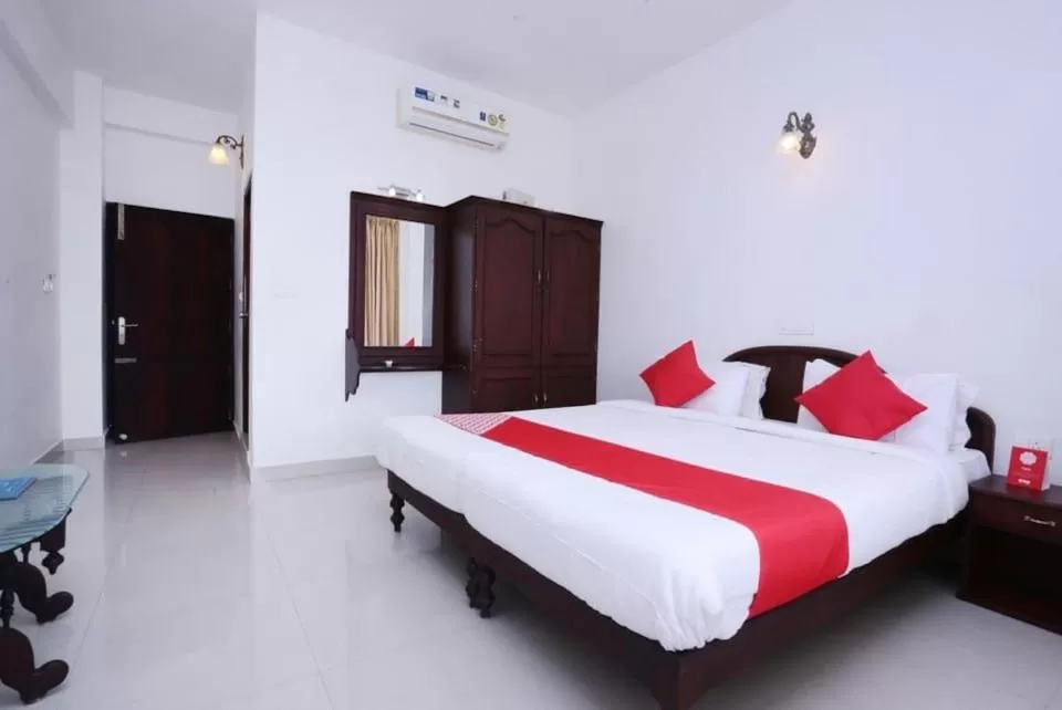 Photo of the whole room, Bed in Swapnatheeram Beach Resort