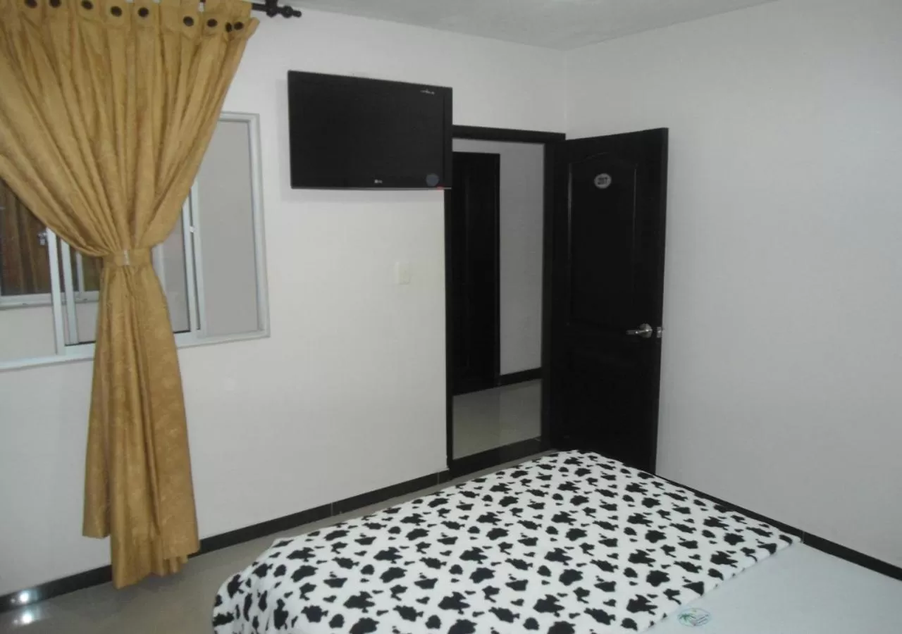 TV/Entertainment Center in Hotel Palmeras De Mariana