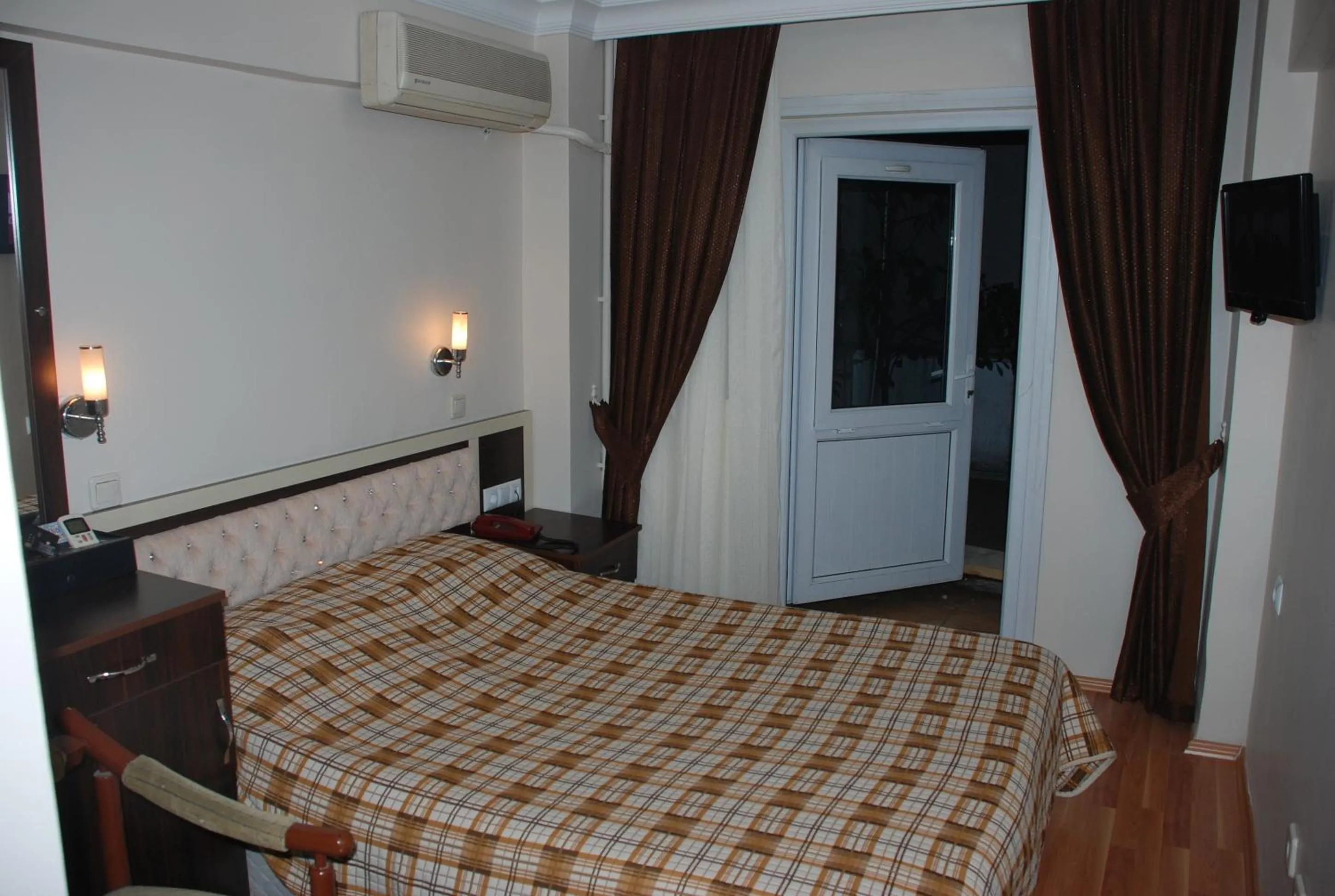 Bed in Hotel Grand Mark