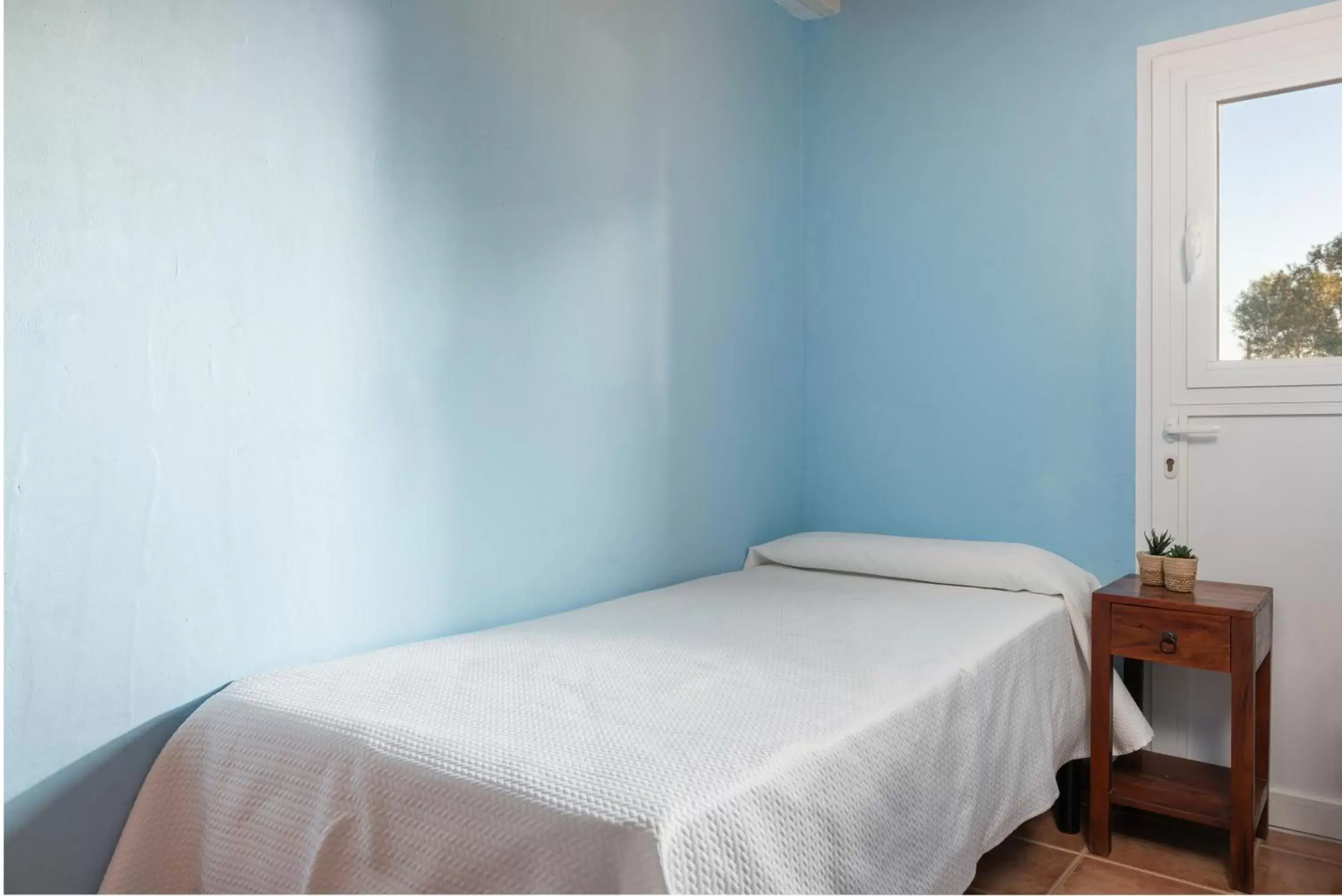 Bed in Finca Hotel Can Canals & Spa Bed in Finca Hotel Can Canals & Spa