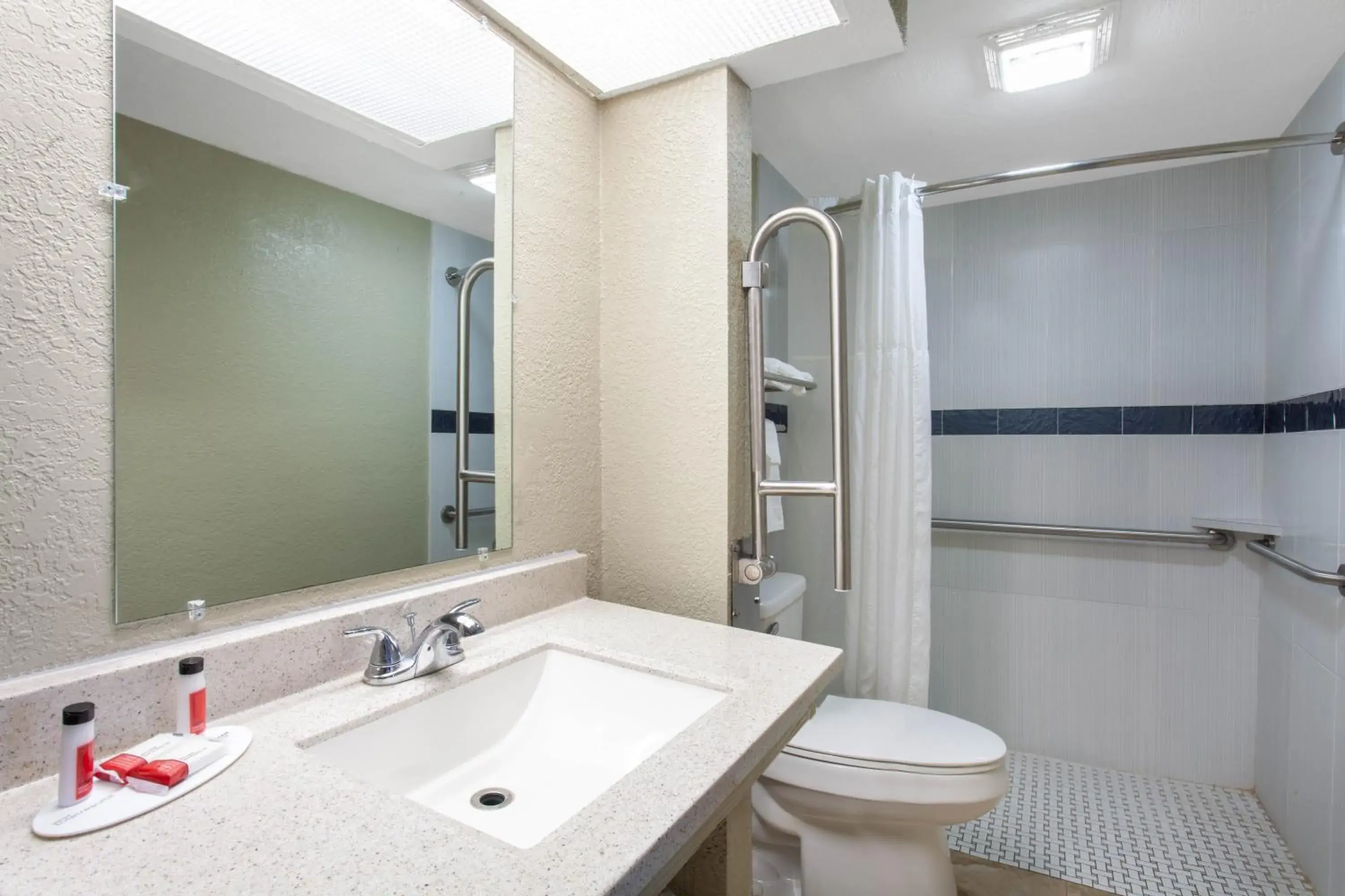 Bathroom in Travelodge by Wyndham Deltona