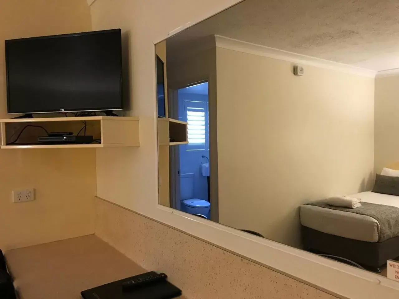 Bathroom, TV/Entertainment Center in Rocky Gardens Motor Inn Rockhampton