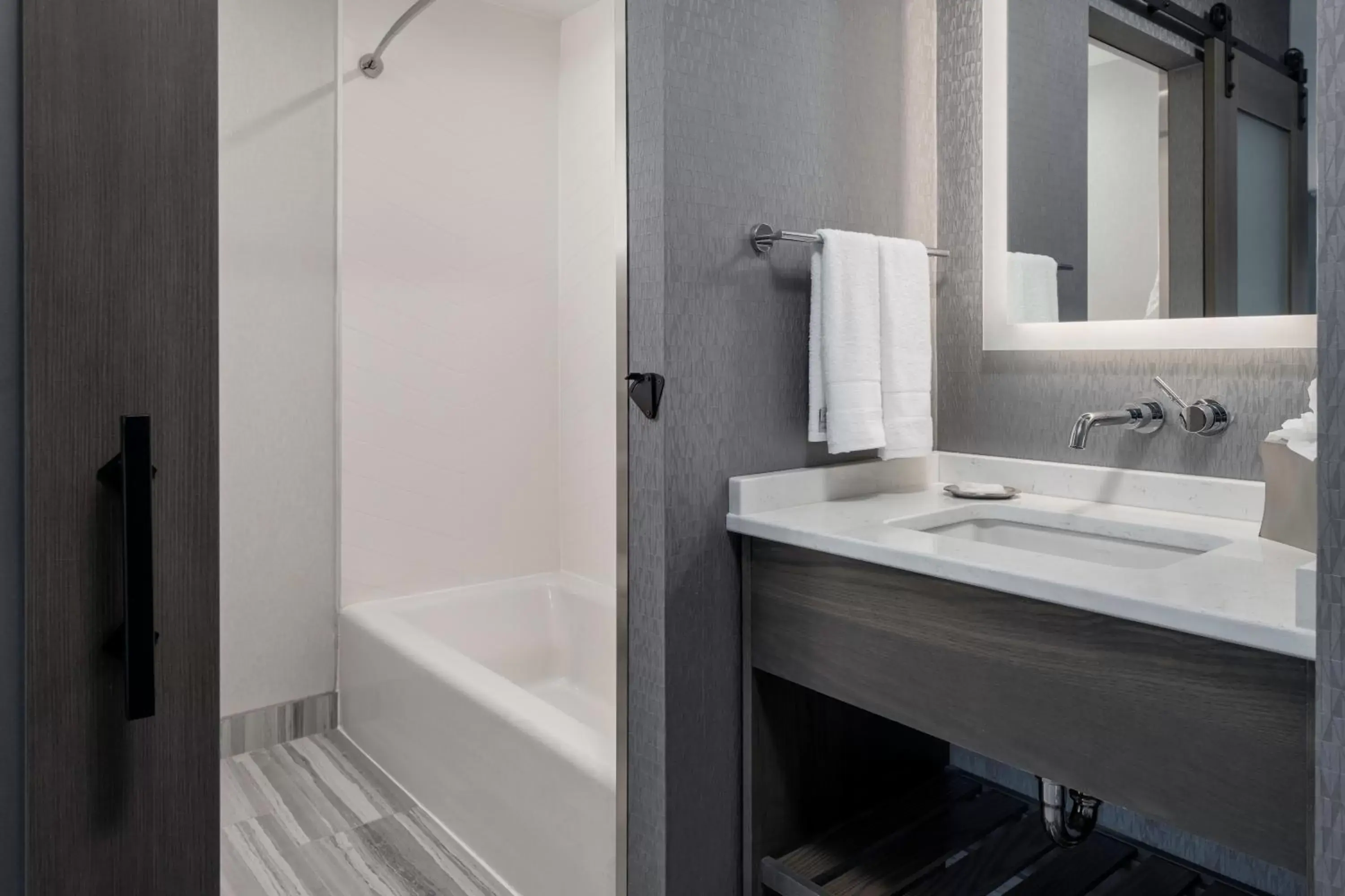 Bathroom in voco - The Cadence, an IHG Hotel