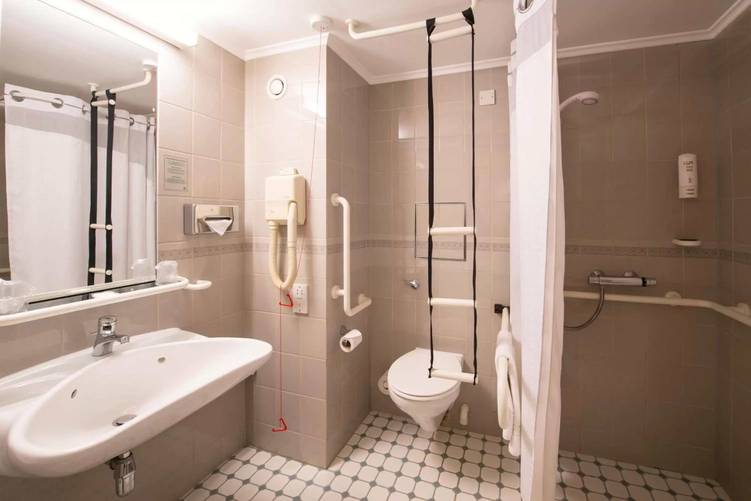 Bathroom in Holiday Inn Northampton, an IHG Hotel