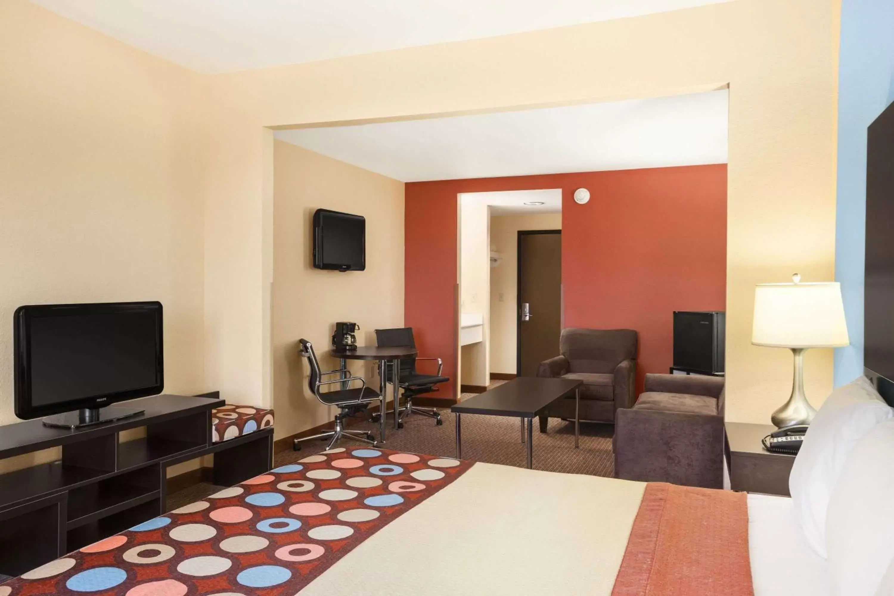 Photo of the whole room, TV/Entertainment Center in Super 8 by Wyndham Pennsville/Wilmington