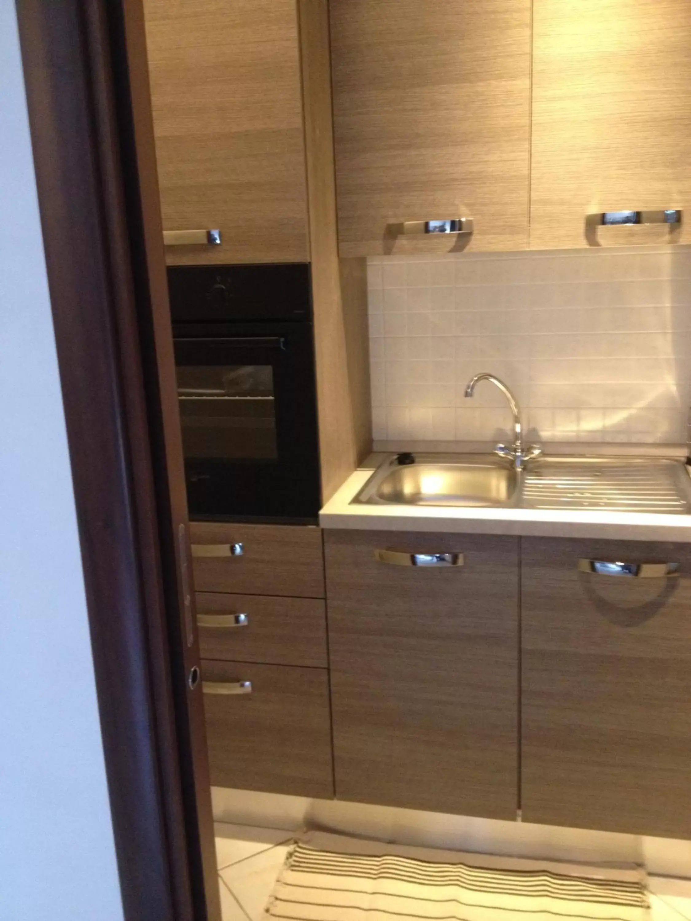 Kitchen/Kitchenette in B&B Via Roma suite