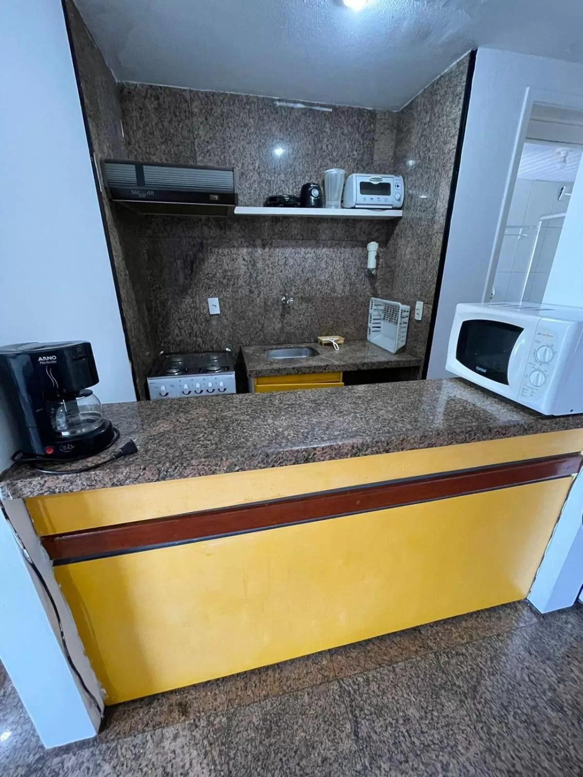 Kitchen/Kitchenette in Flat Atlântico Neto