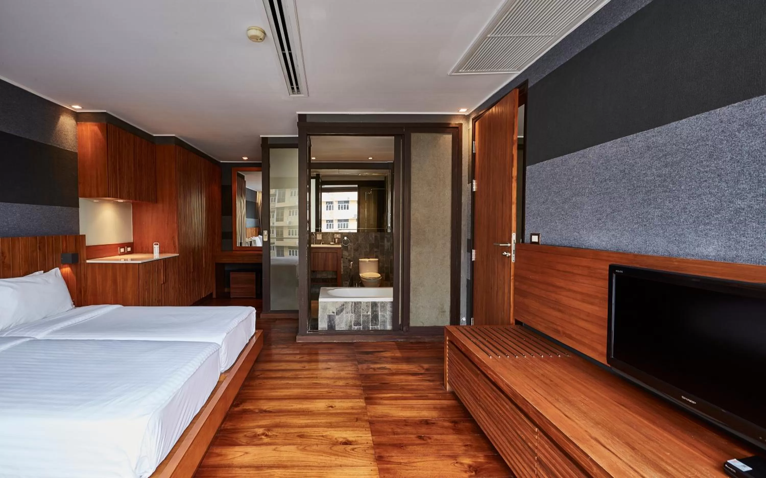 Bed in LUXX Langsuan Hotel - SHA Plus