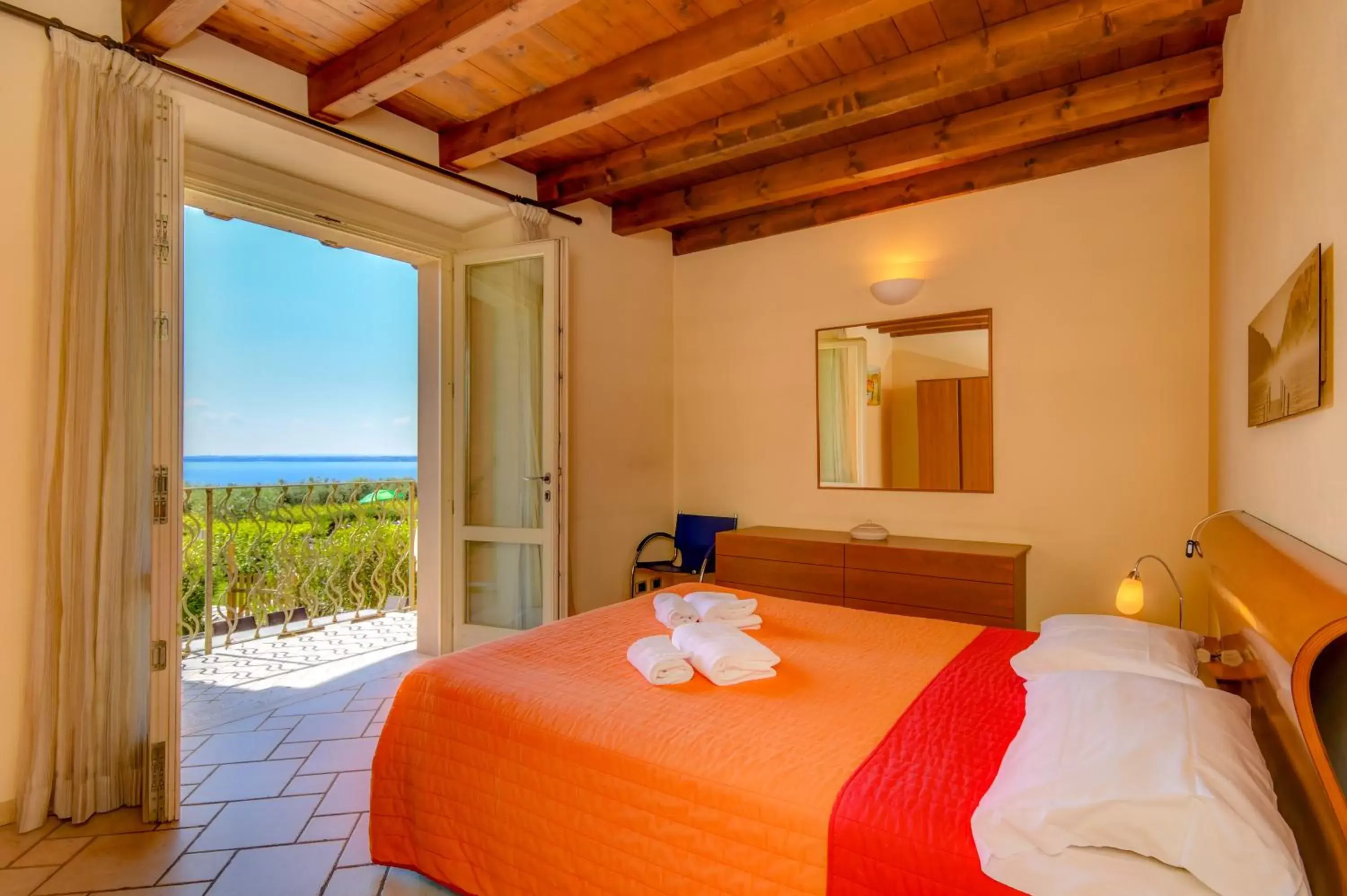 Bedroom in Residence Corte Ferrari -Ciao Vacanze-