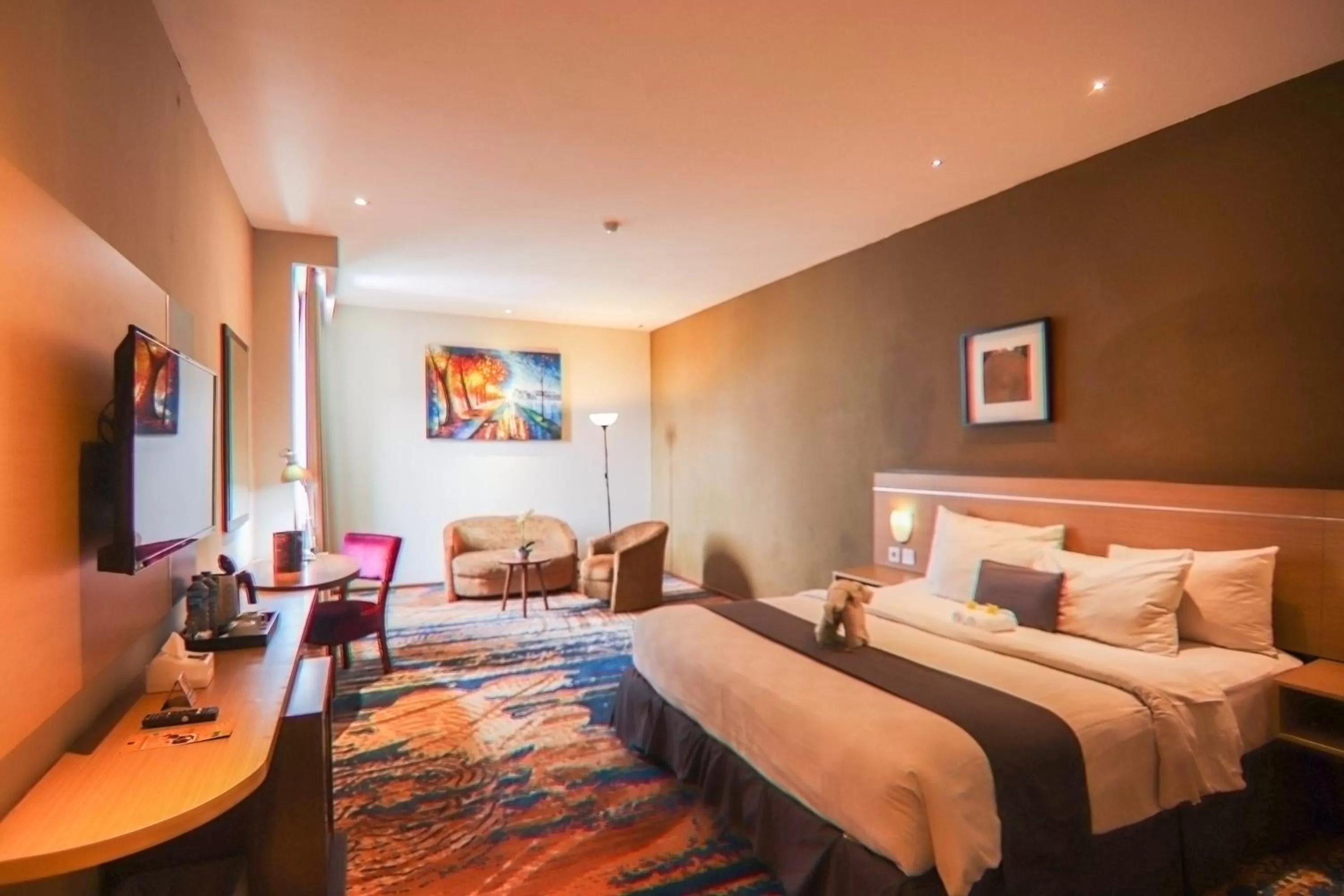 Bed in De Laxston Hotel Yogyakarta, Azana Hotels Collection