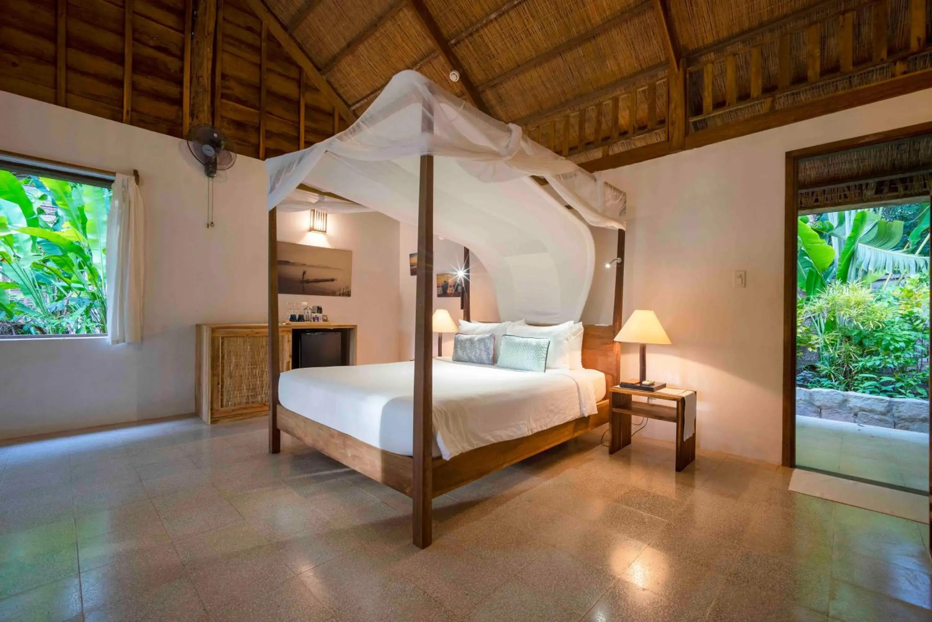 Bed in Mango Bay Resort