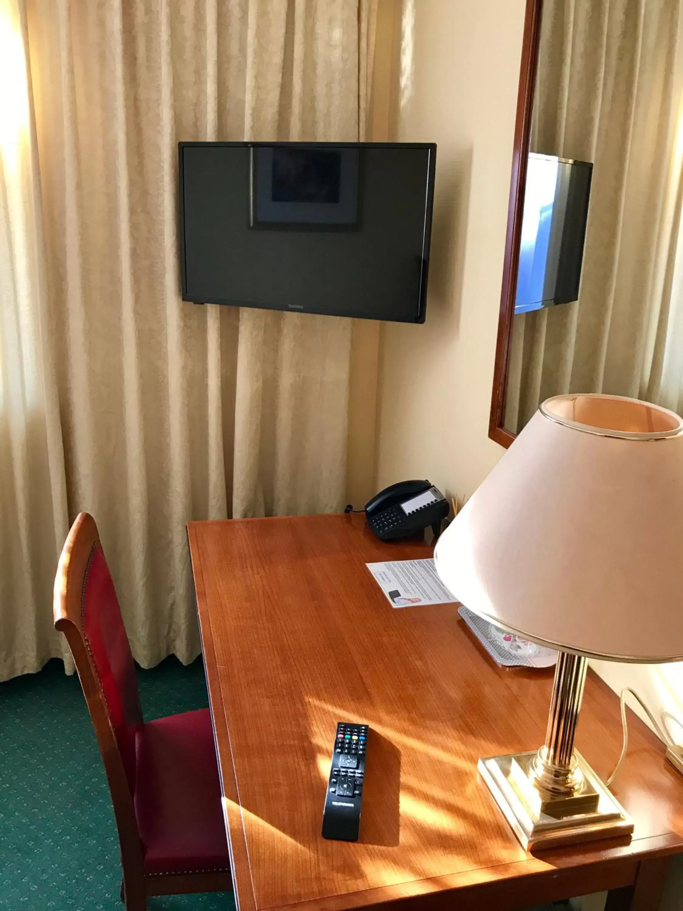Photo of the whole room, TV/Entertainment Center in Hotel Residenz Stockstadt