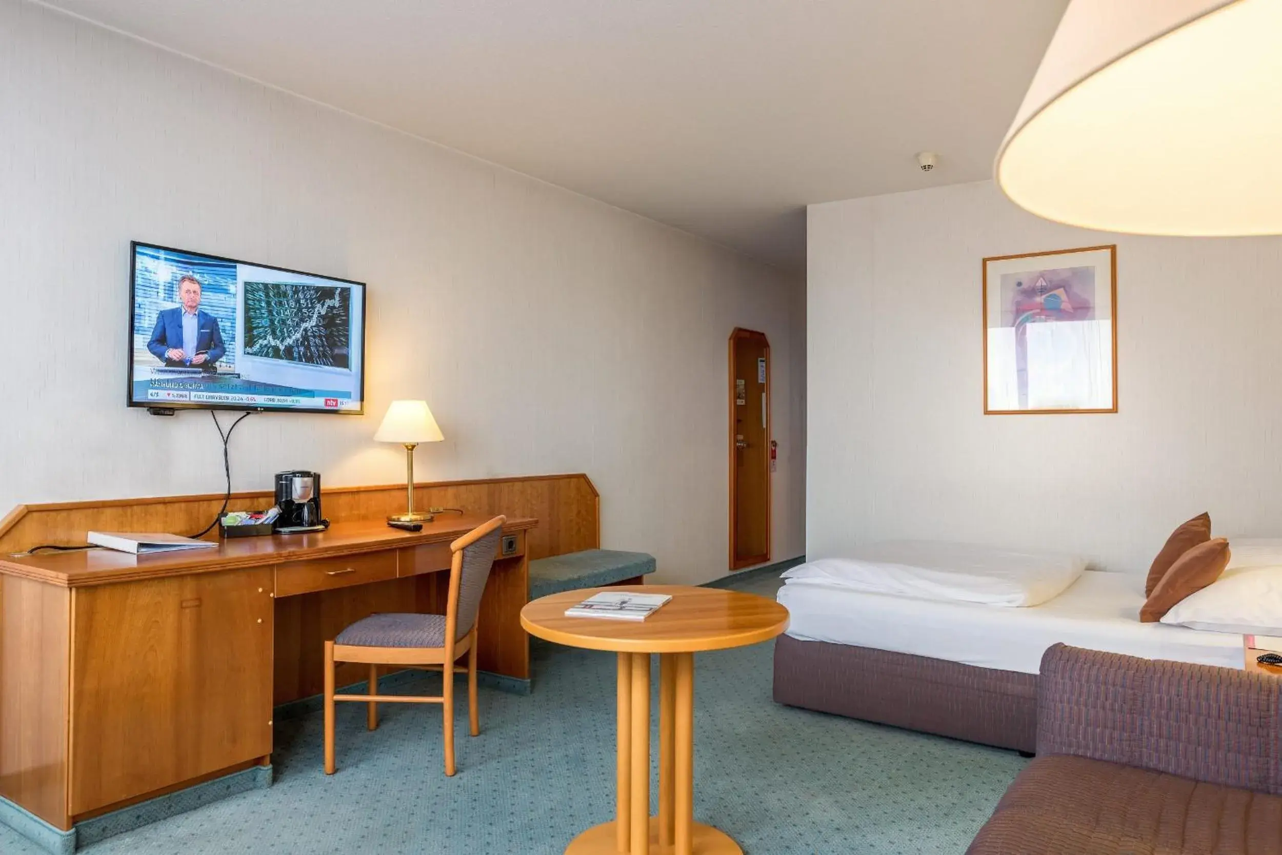 Photo of the whole room, Bed in Leoso Hotel Ludwigshafen