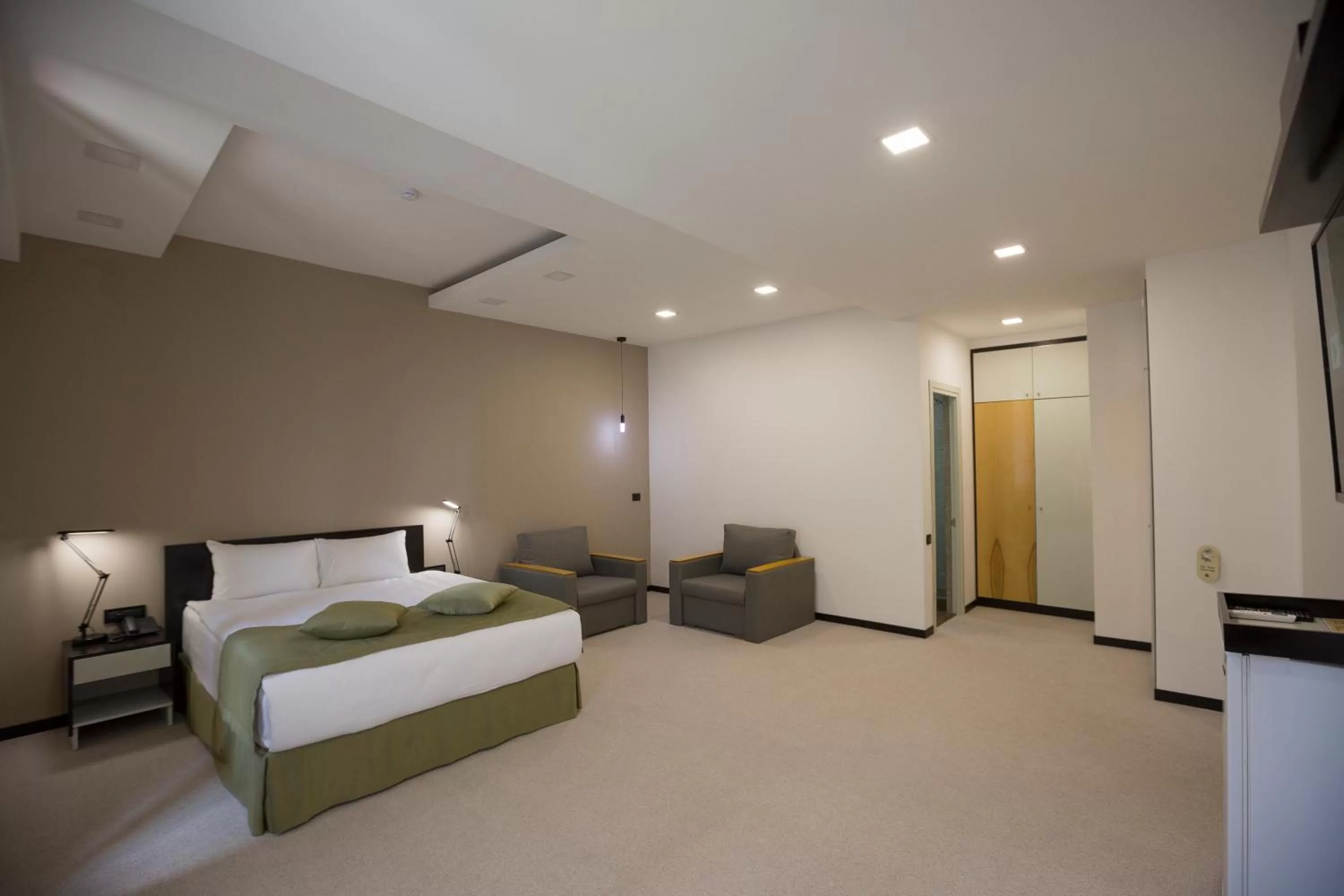 Bed in AnnaBella Boutique Hotel