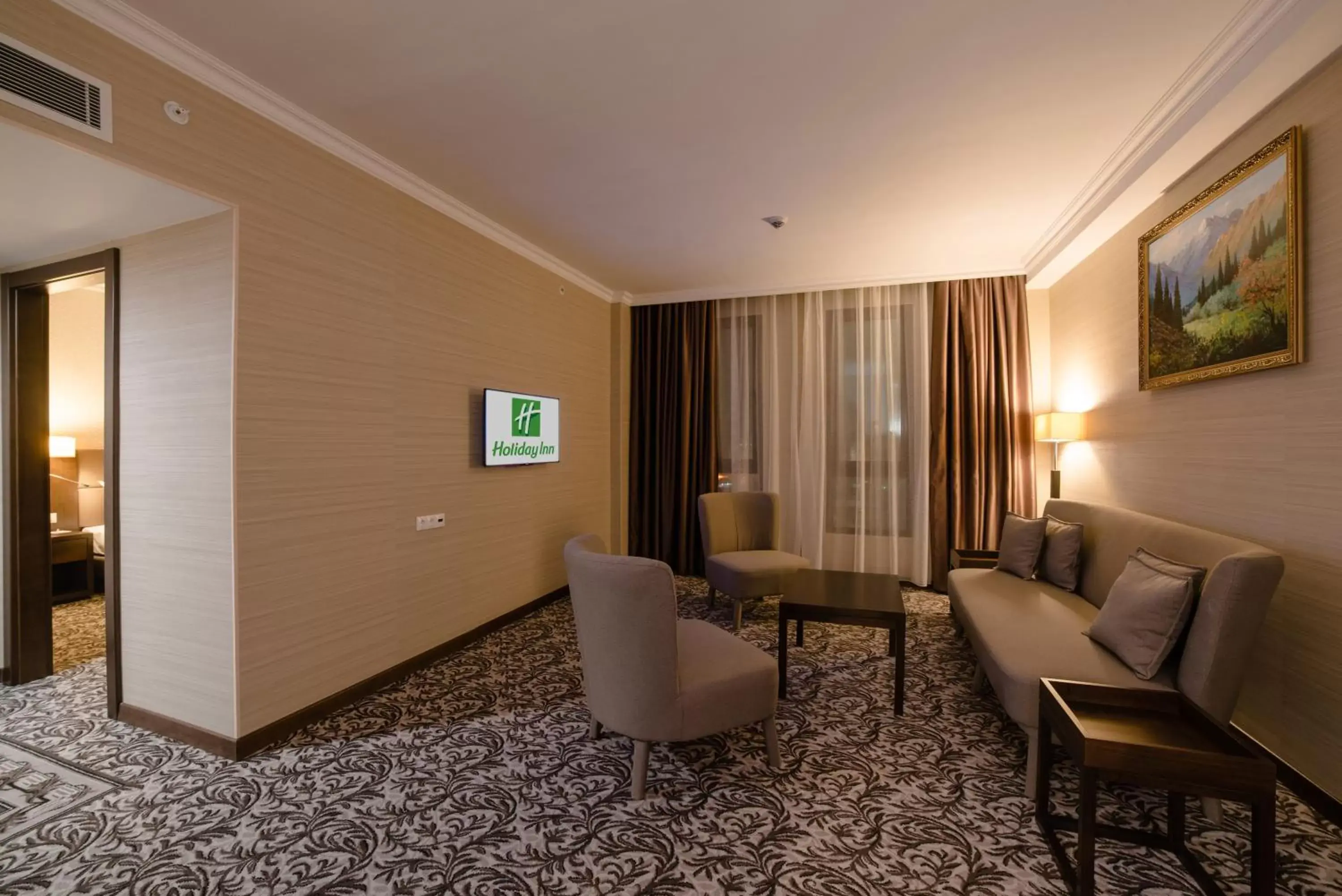 Photo of the whole room, Seating Area in Holiday Inn Aktau, an IHG Hotel