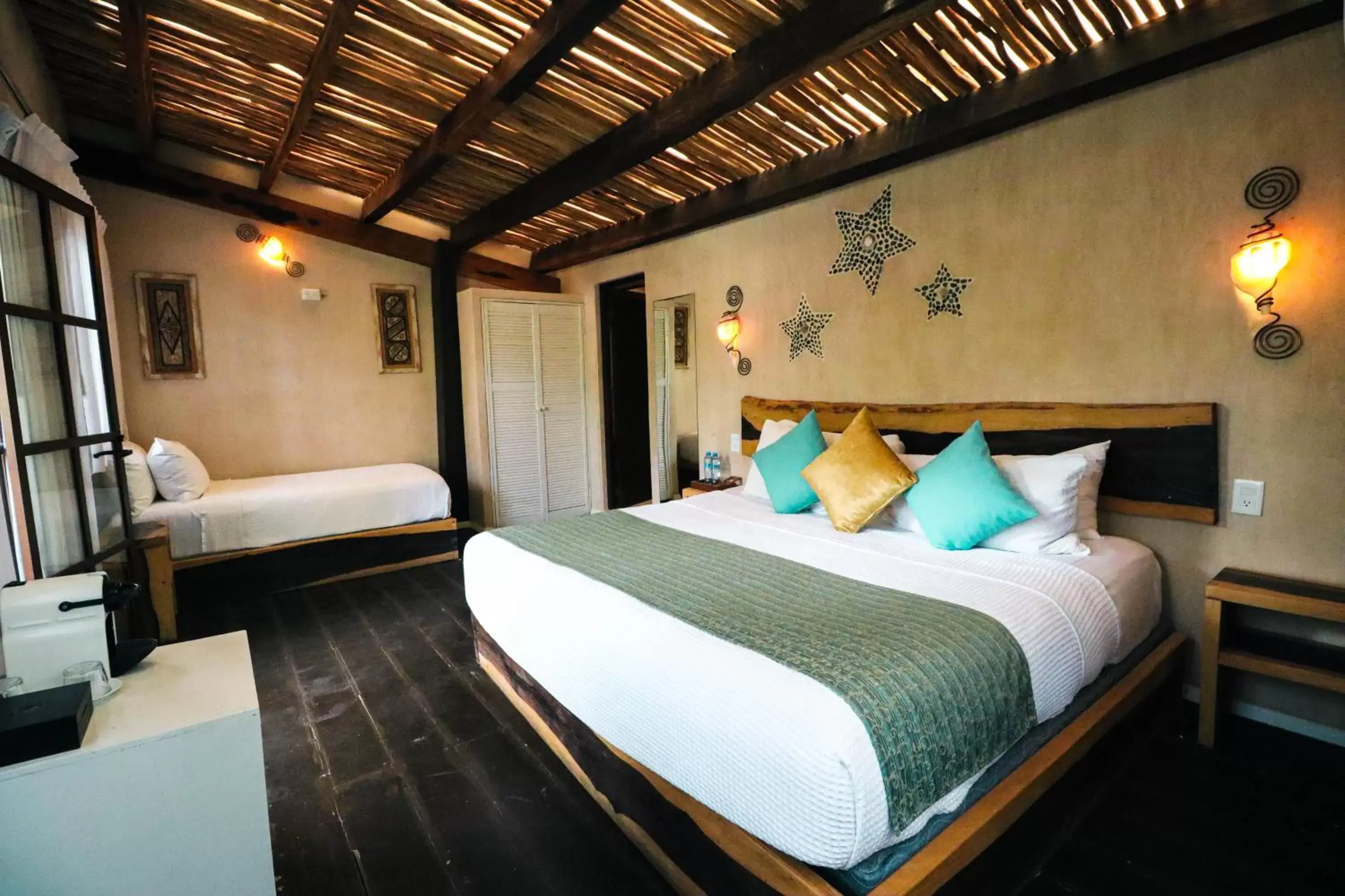 Bedroom, Bed in Villa Las Estrellas Tulum - located at the party zone