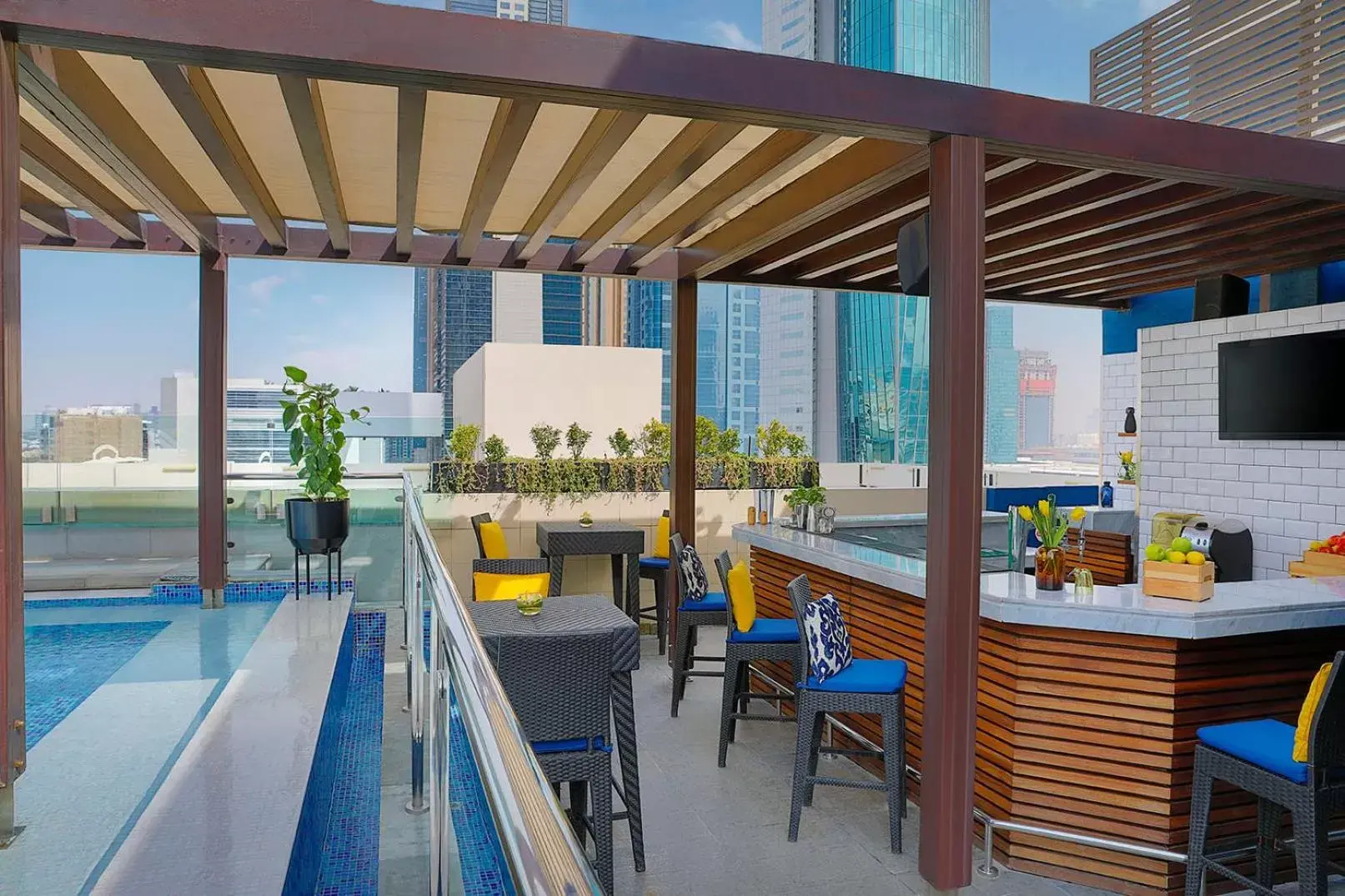 Lounge or bar, Swimming Pool in Nassima Tower Hotel Apartments