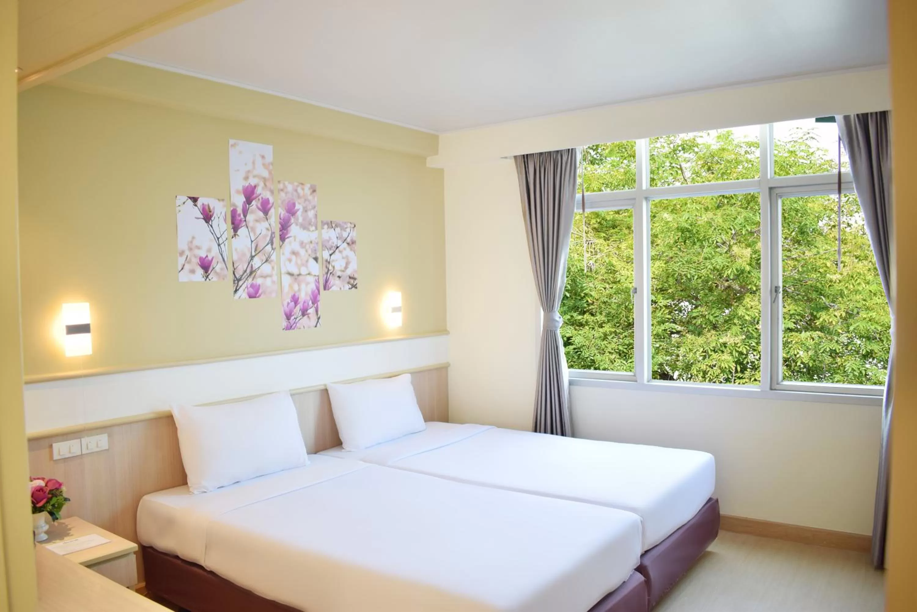 Bed in Trang Hotel Bangkok - SHA Plus