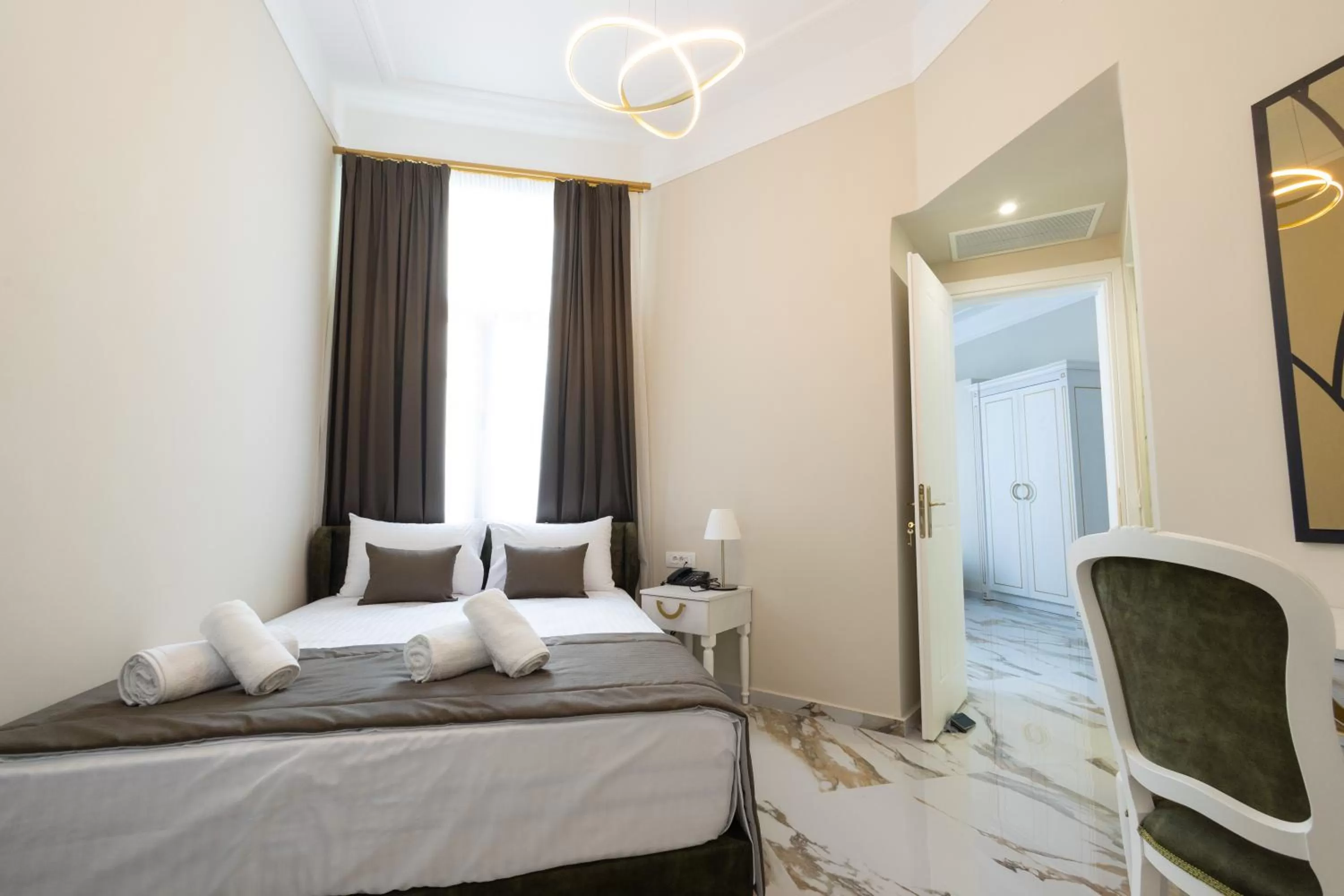 Bed in Modern Revival Luxury Hotel