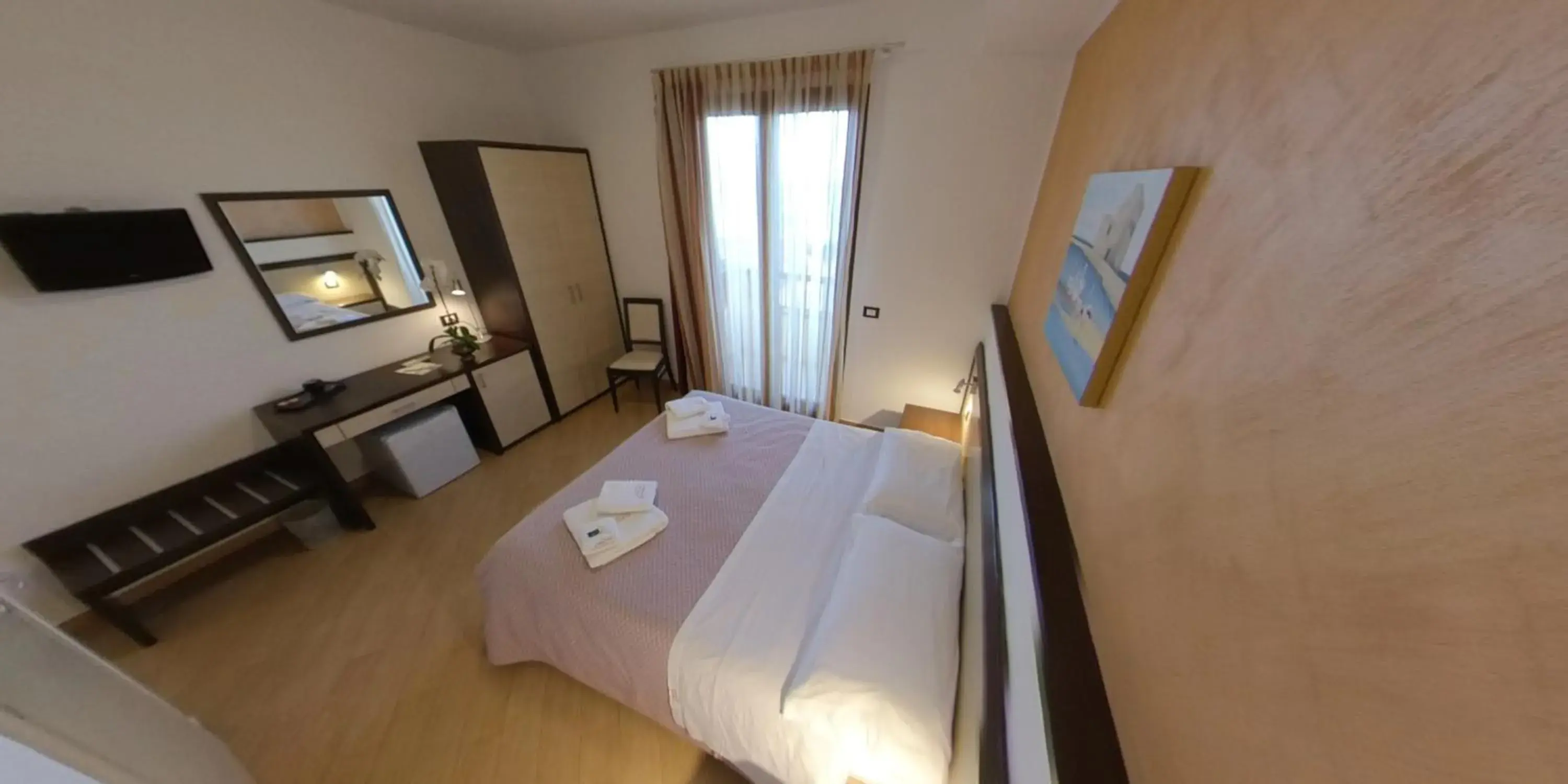 Bed in Albergo Perseo