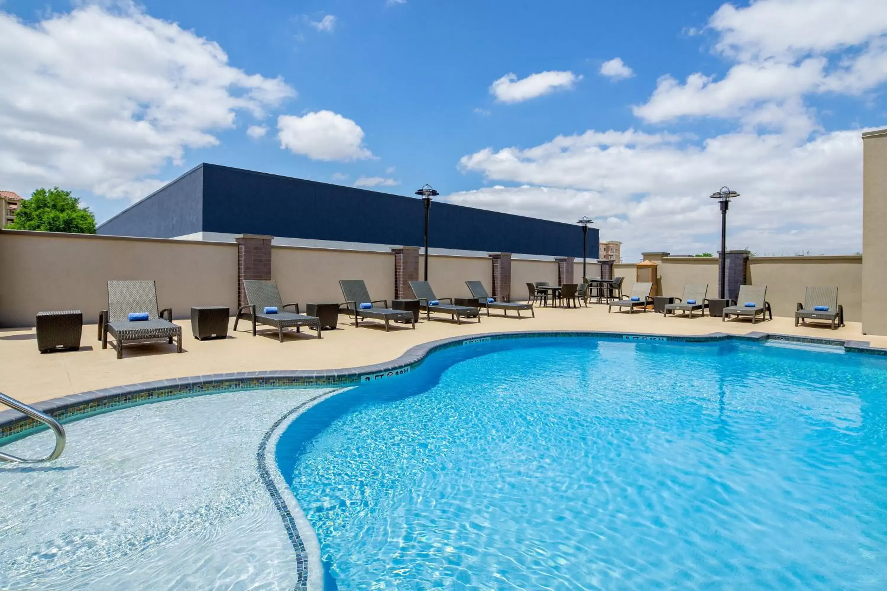 Swimming Pool in Holiday Inn Express & Suites Lubbock Central - Univ Area, an IHG Hotel