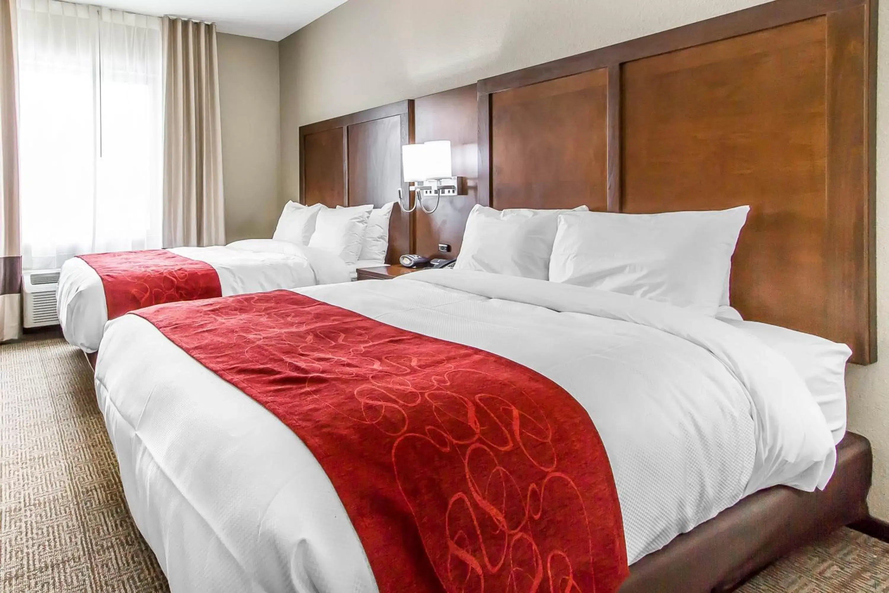 Bed in Comfort Suites West Omaha