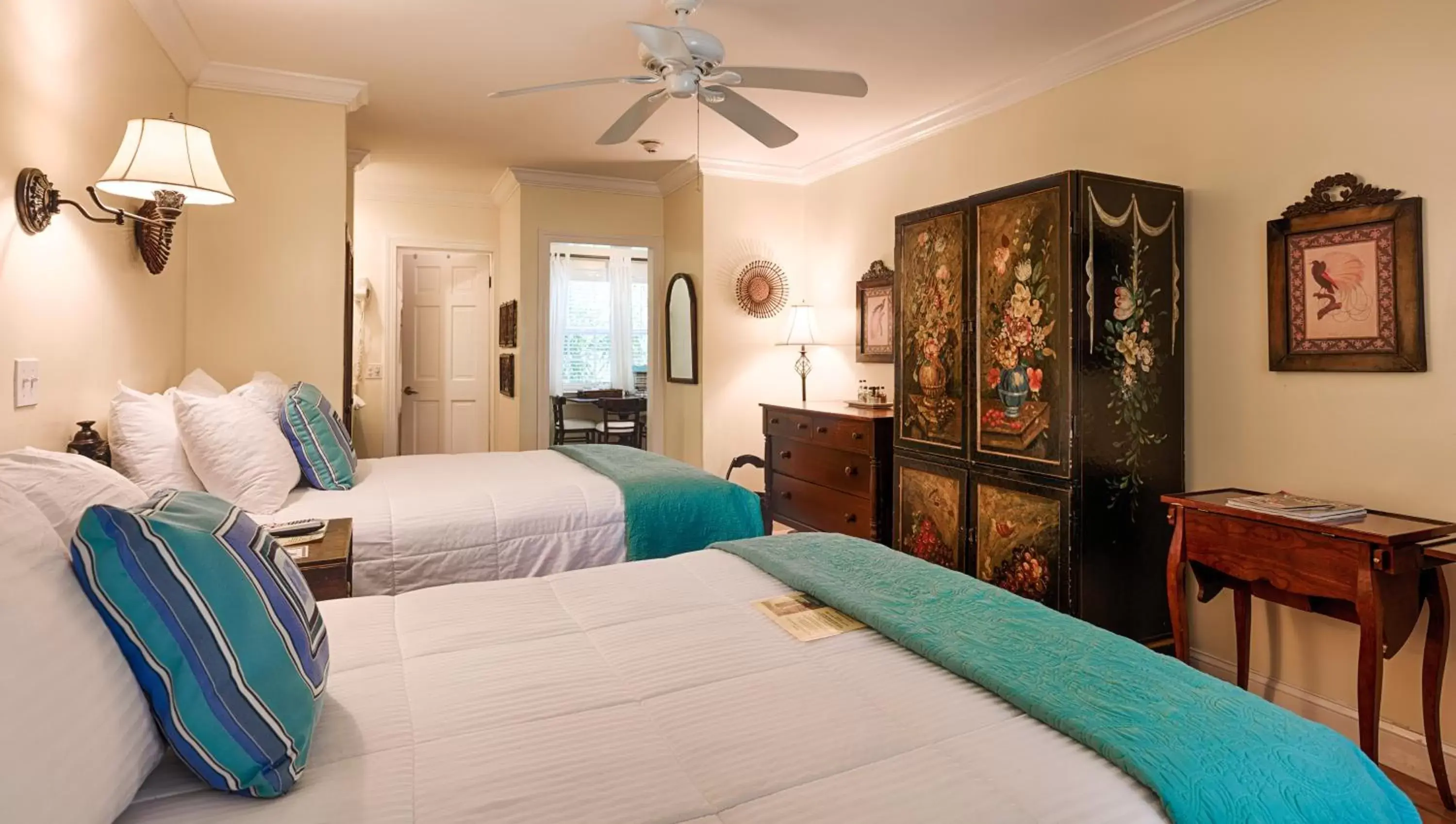 Bedroom, Bed in The Caribbean Court Boutique Hotel