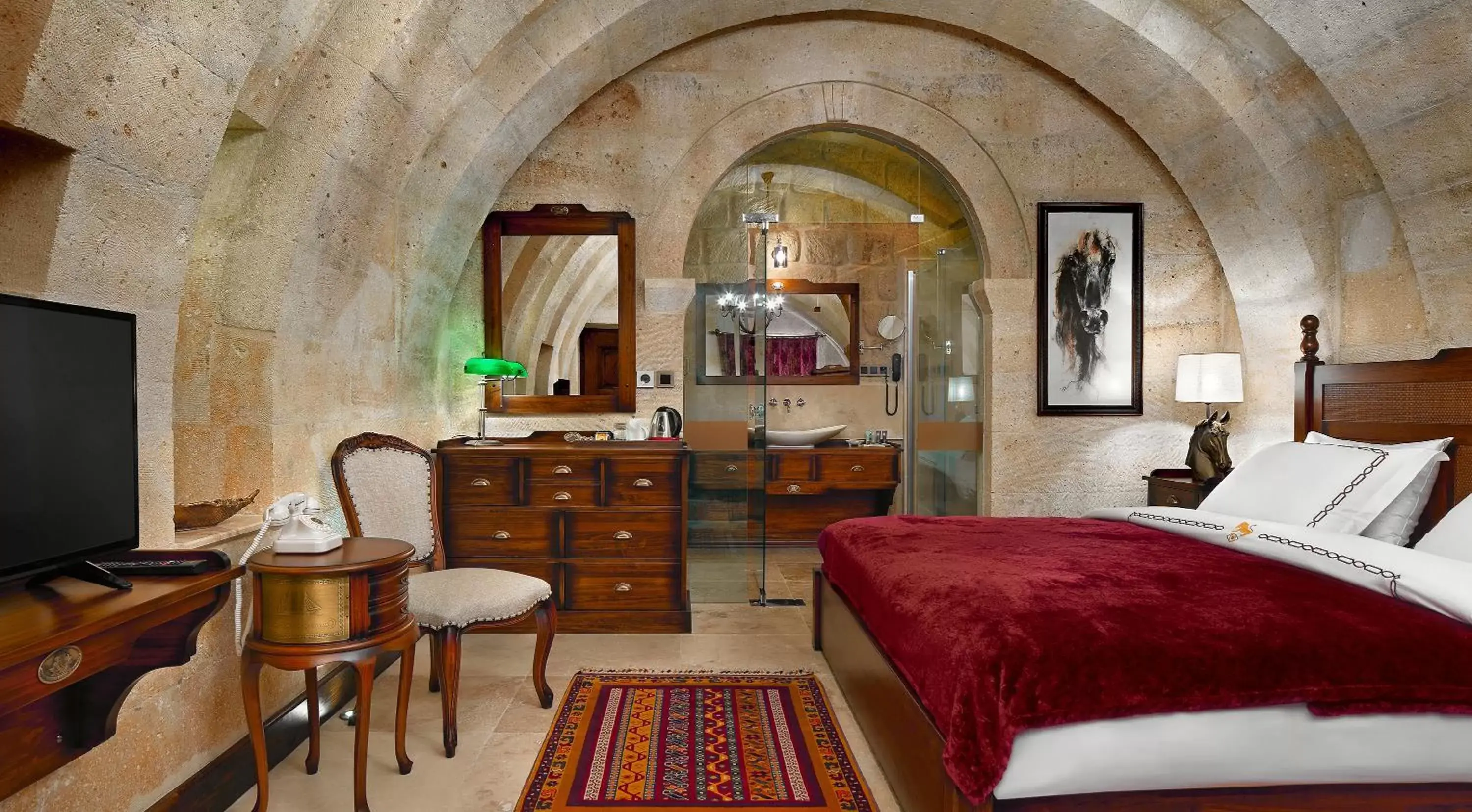 Bed in Seraphim Cave Suites & SPA