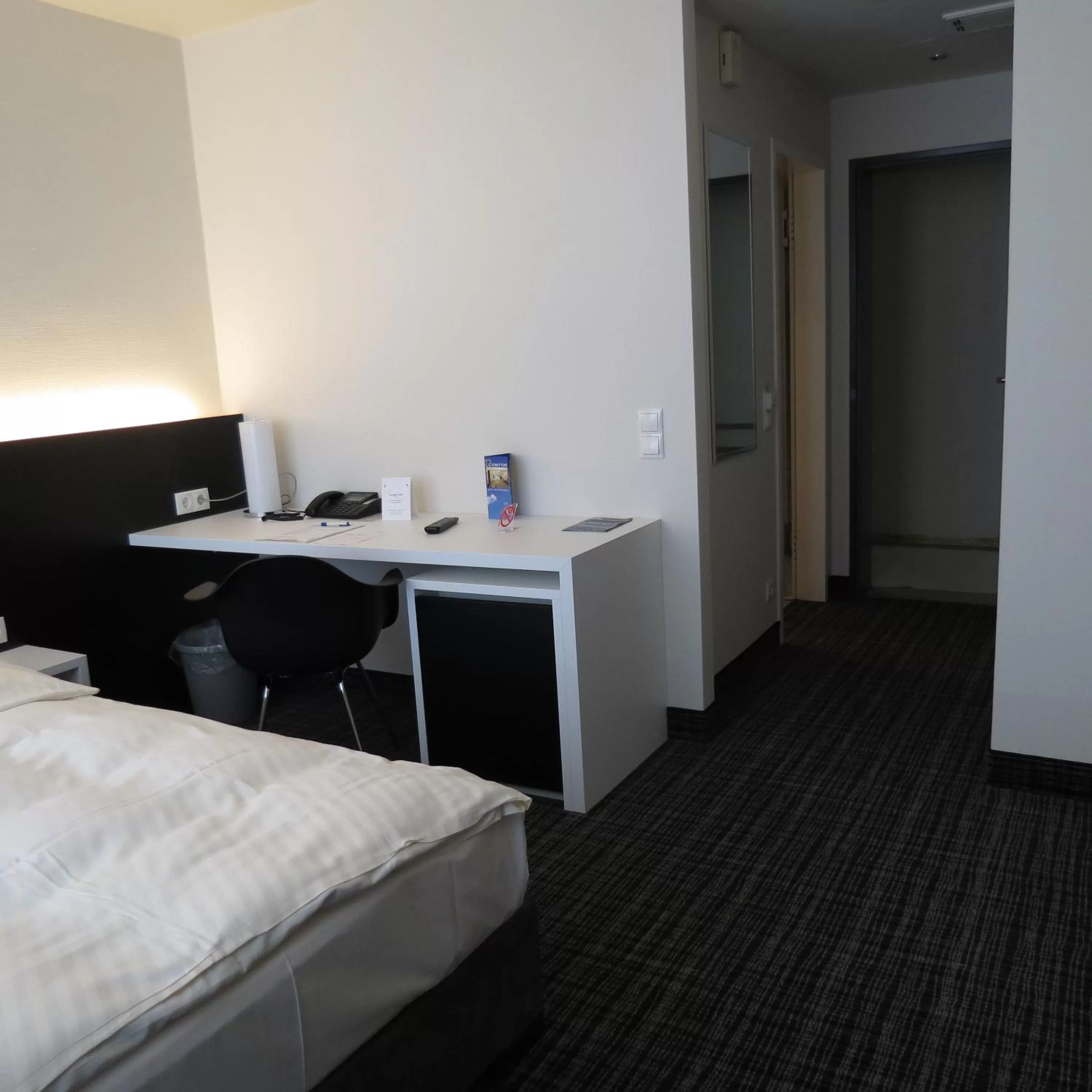 Photo of the whole room, Bed in Comfor Hotel Ulm City
