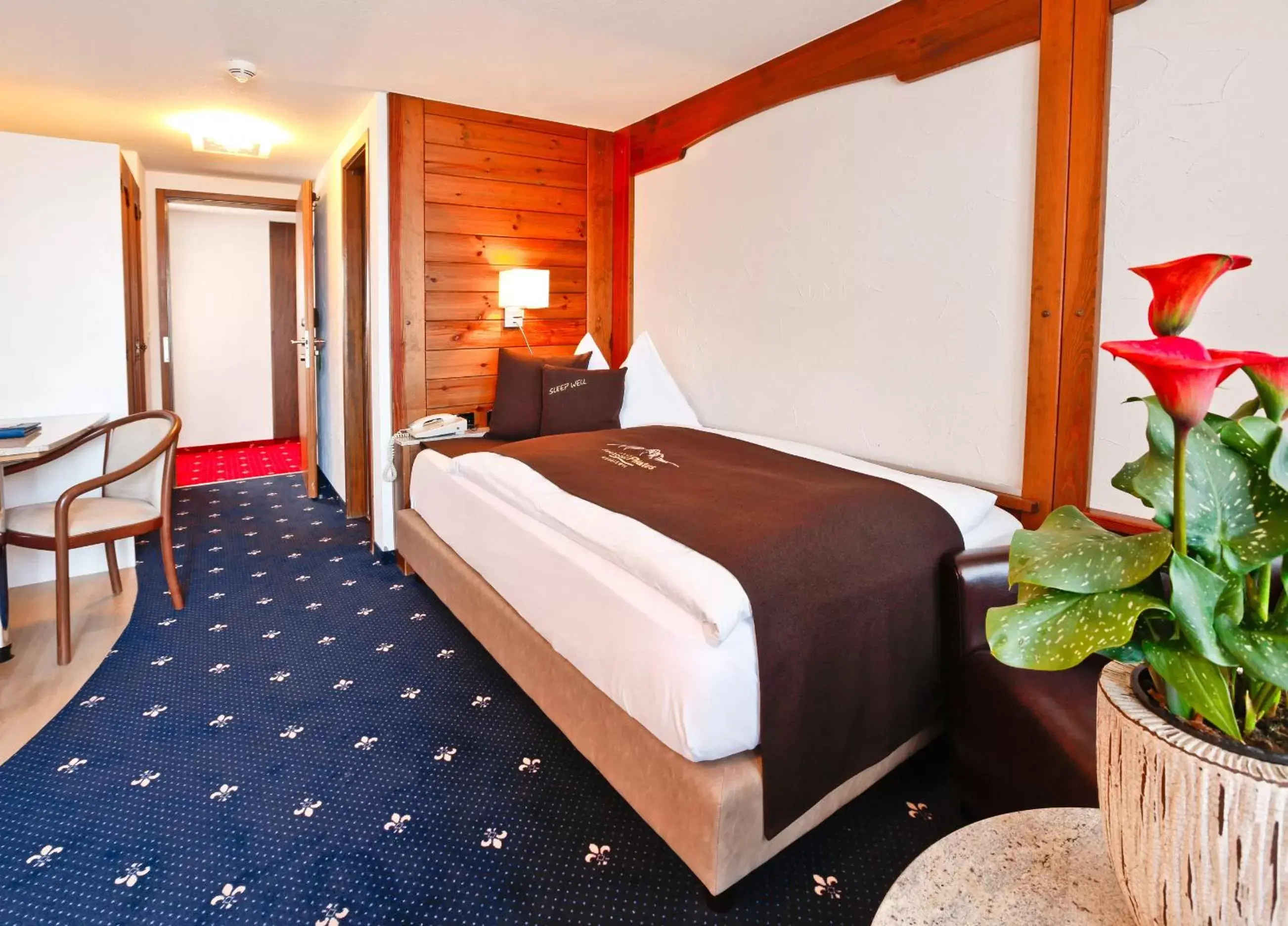 Photo of the whole room, Bed in Seehotel Pilatus