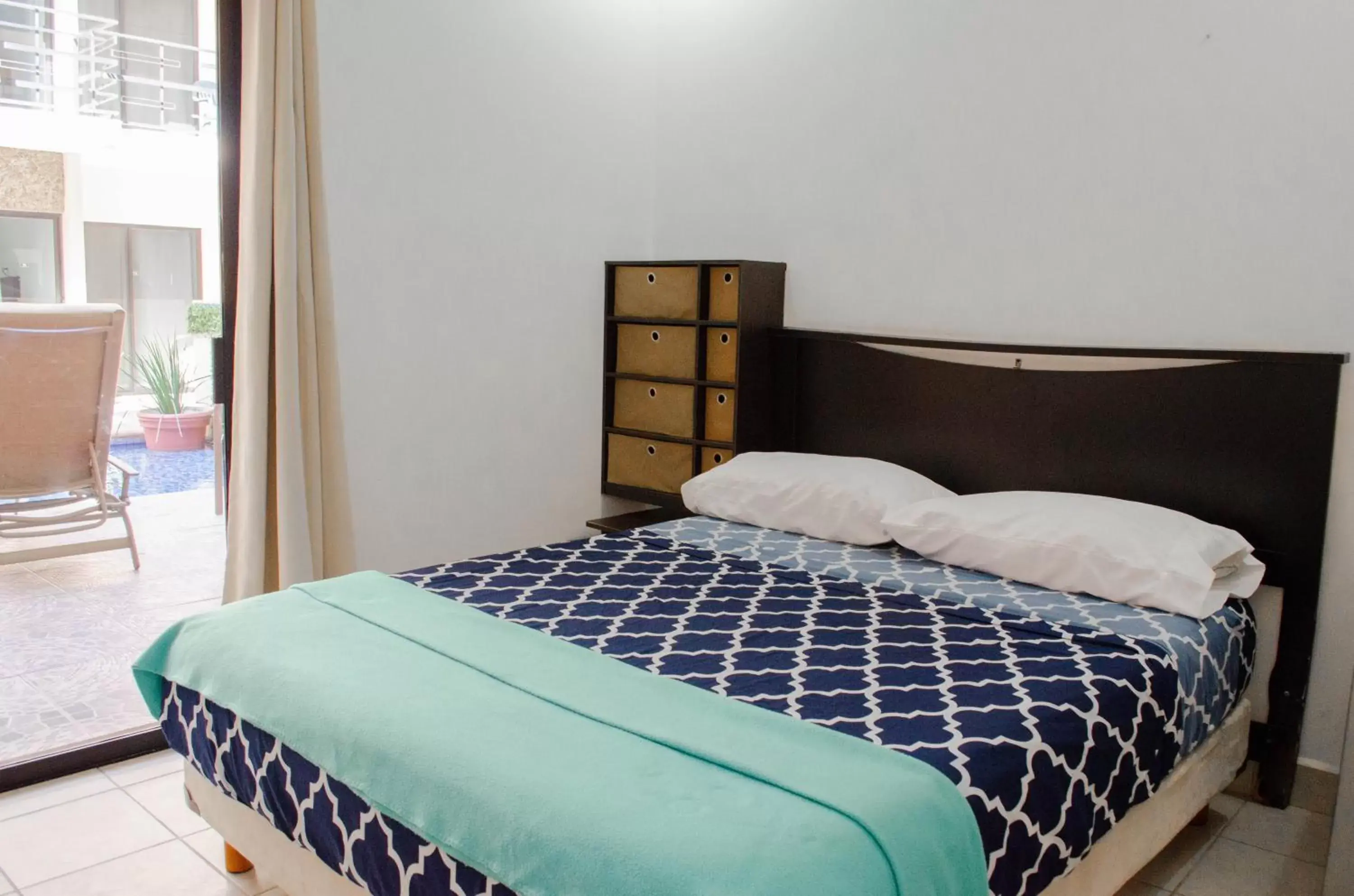 Bed in Pedregal Suites - Marina and Downtown