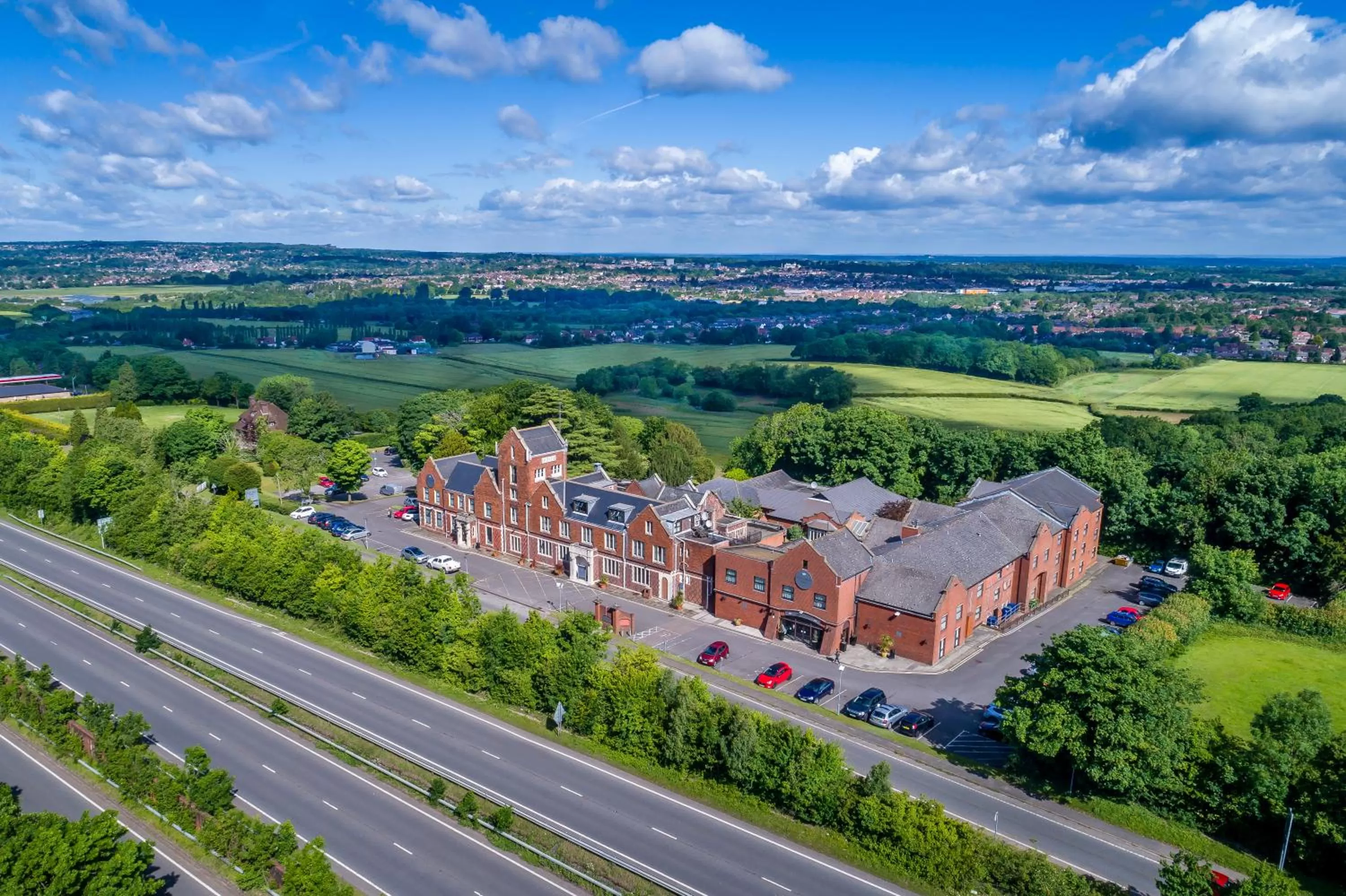 Property building in Hogs Back Hotel & Spa Nr Farnham
