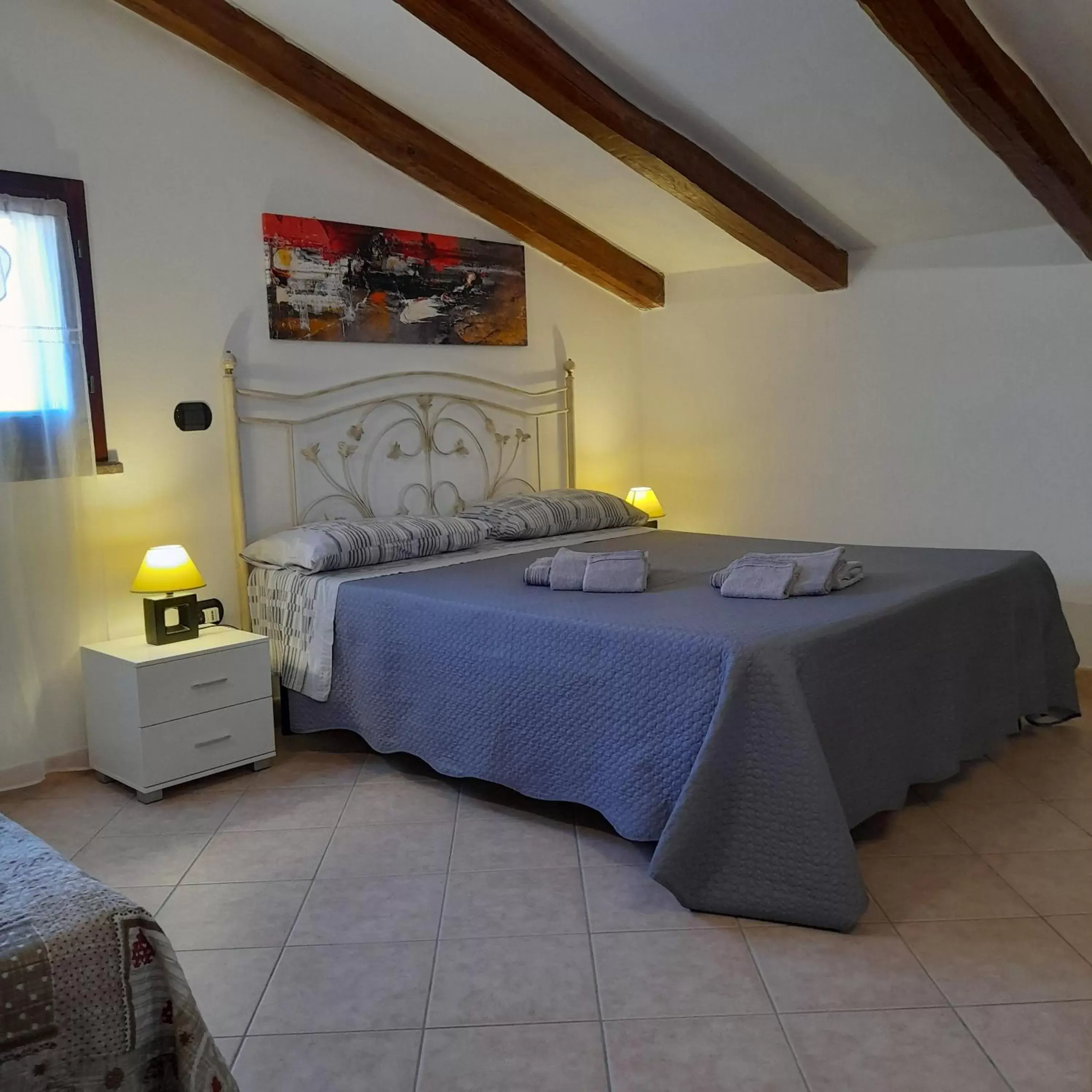 Bedroom, Bed in La Fortezza casa vacanze & appartament