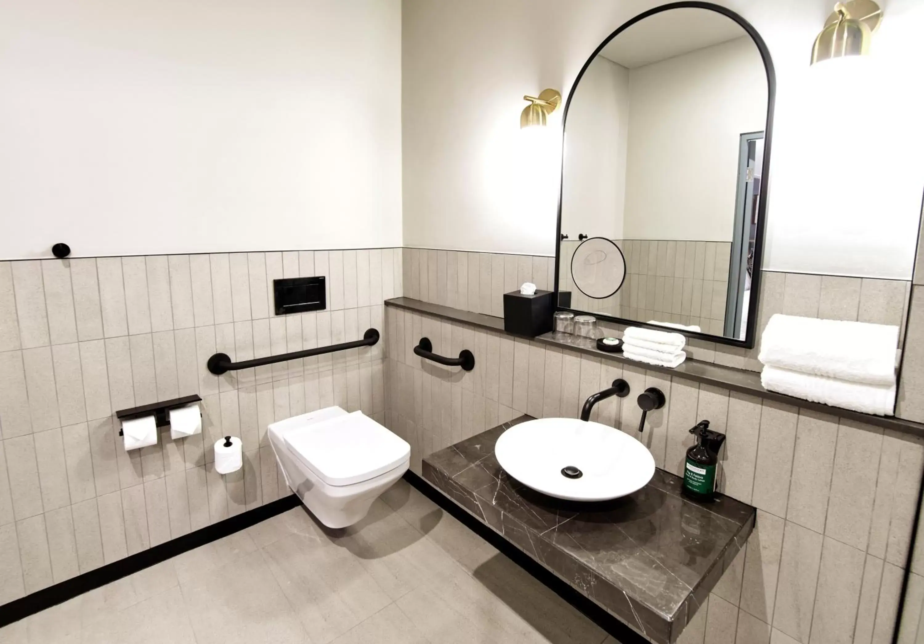 Toilet, Bathroom in voco Johannesburg Rosebank an IHG Hotel