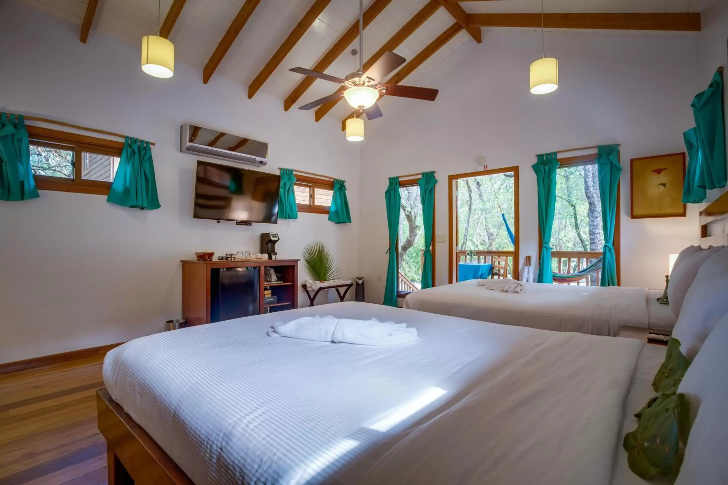 Bed in Mariposa Belize Beach Resort