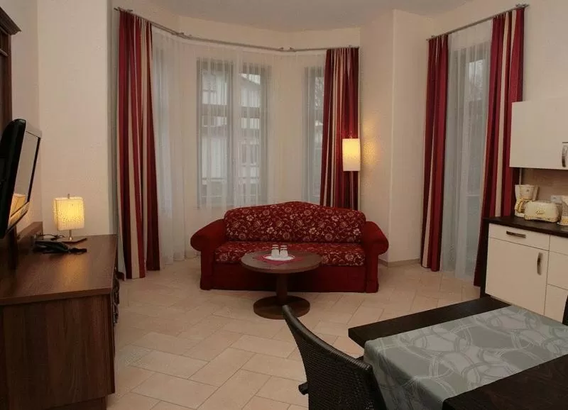 Kitchen or kitchenette, Bed in Waldhotel