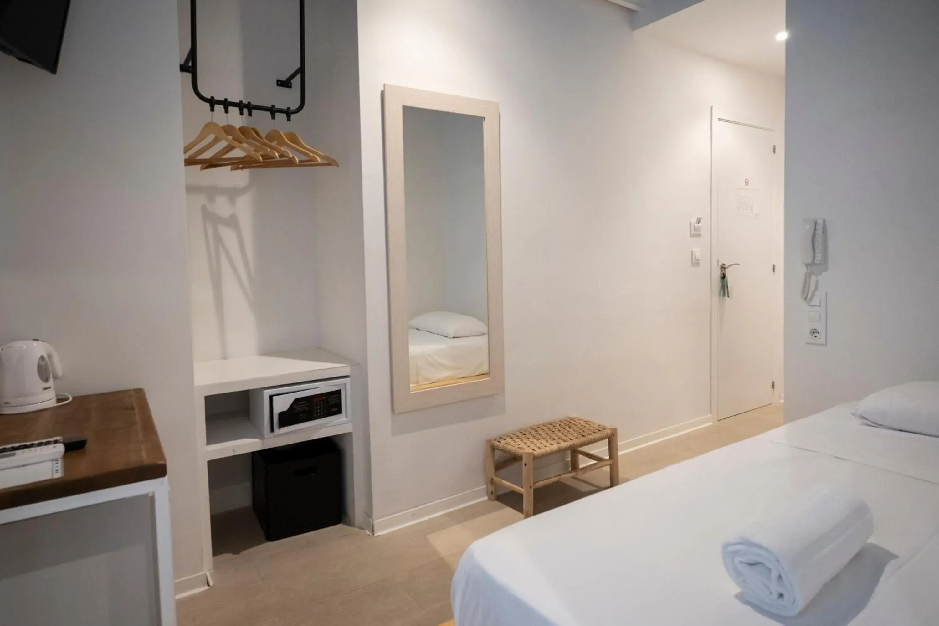 Bed, Bathroom in You & Co. Saler Beach boutique