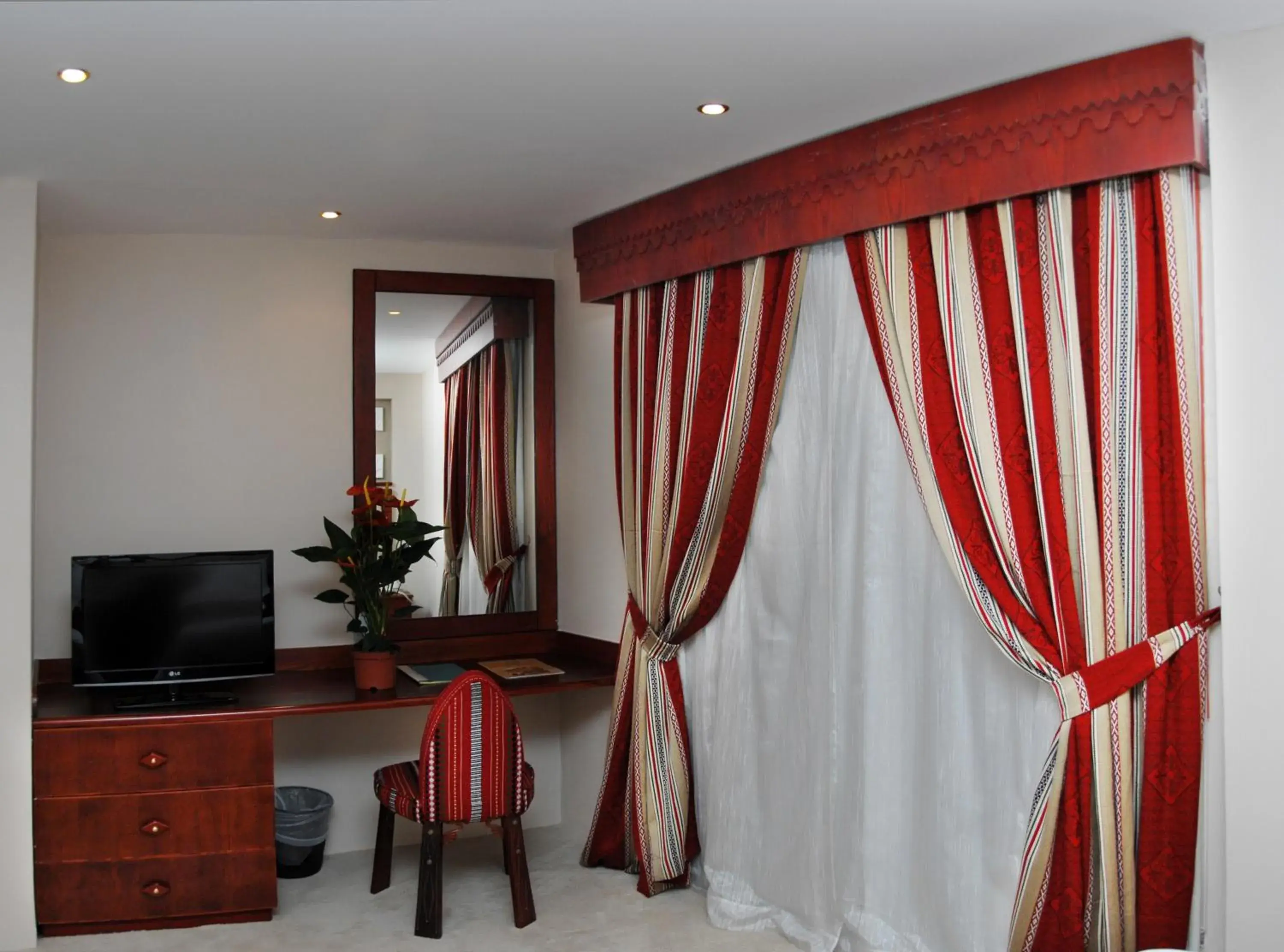 Bedroom, Seating Area in Al Liwan Suites