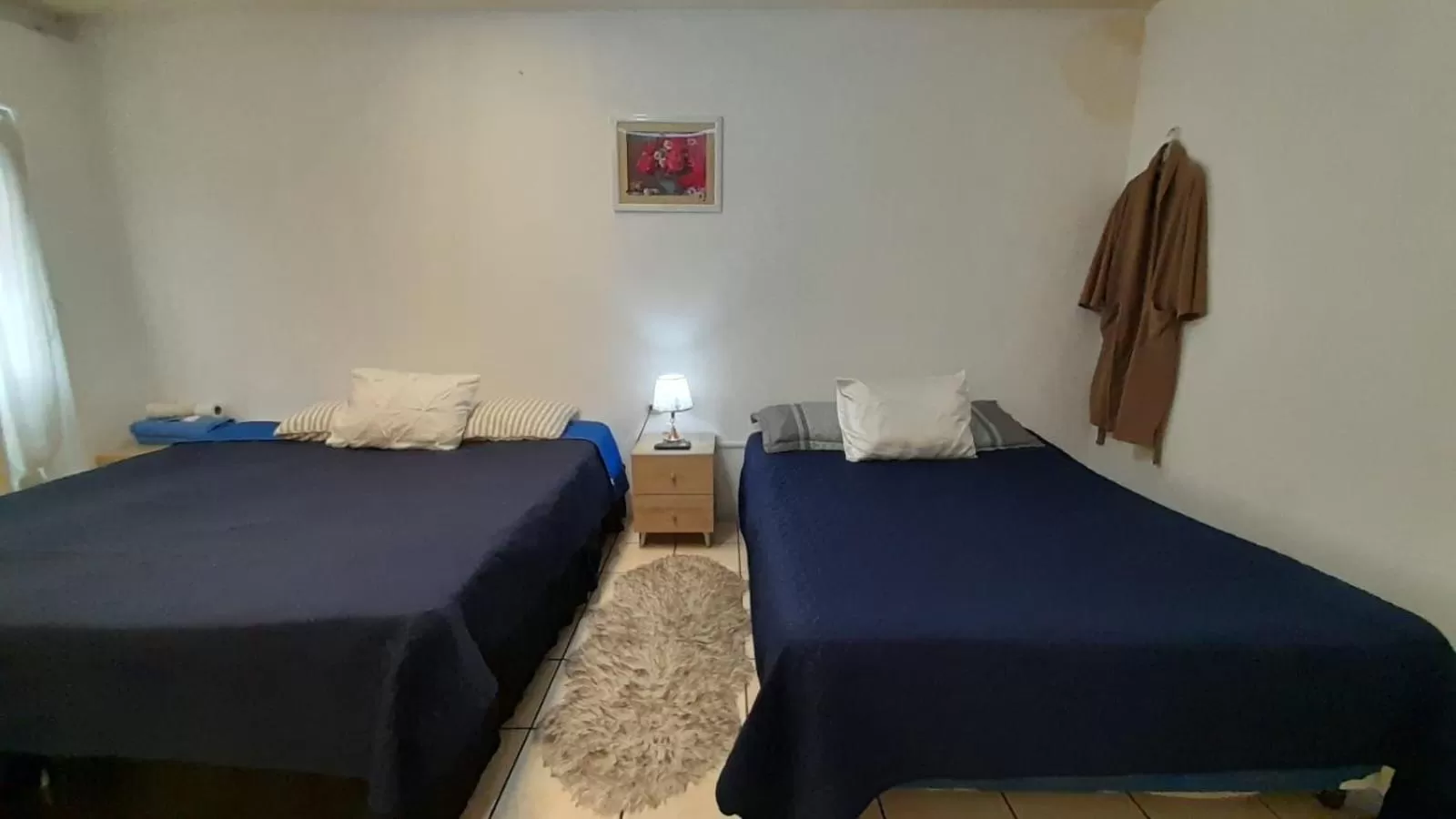 Bed in Hotel Bluehouse