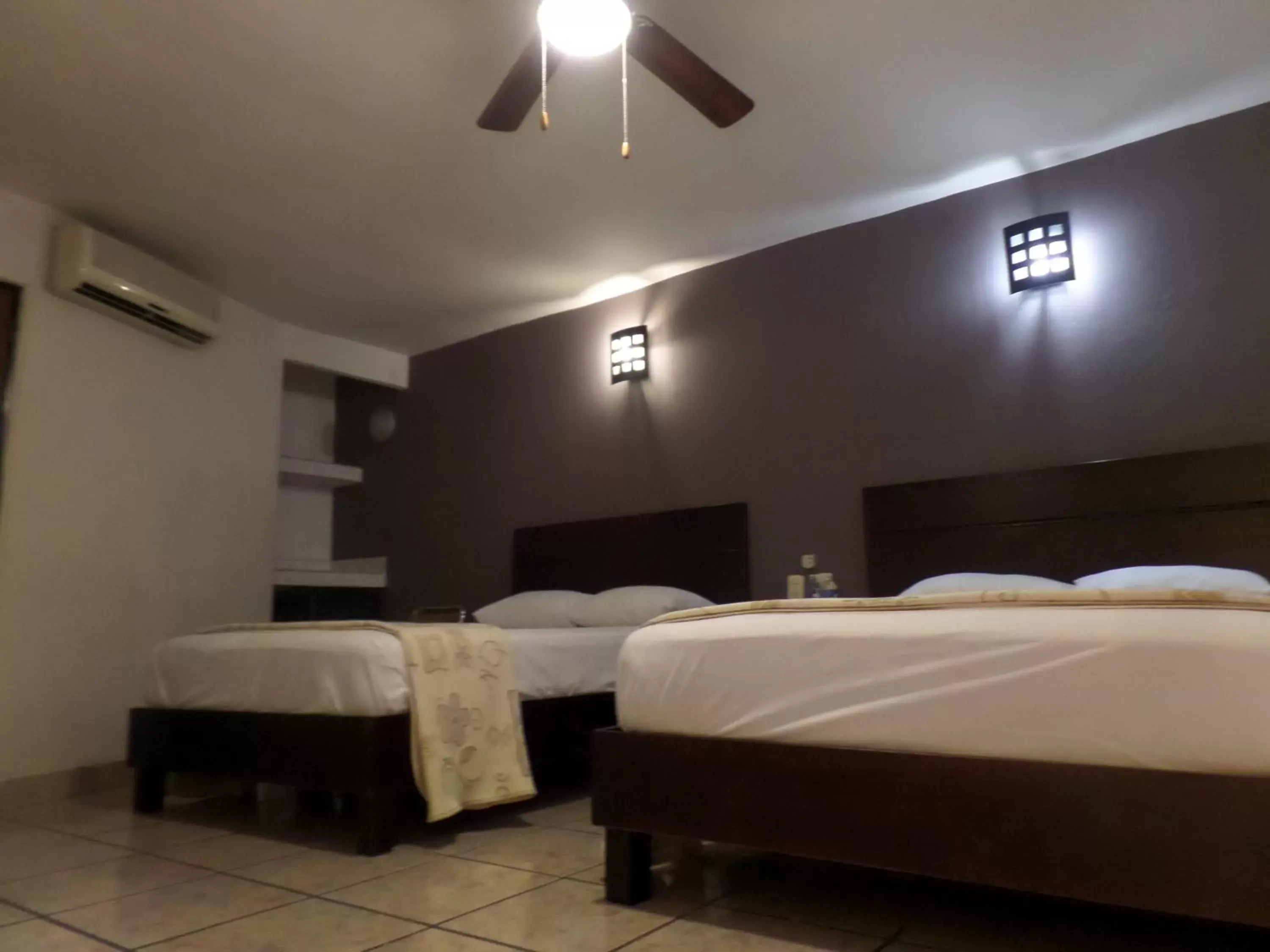 Bed in Uke Inn Hotel & Suites Xamaipak